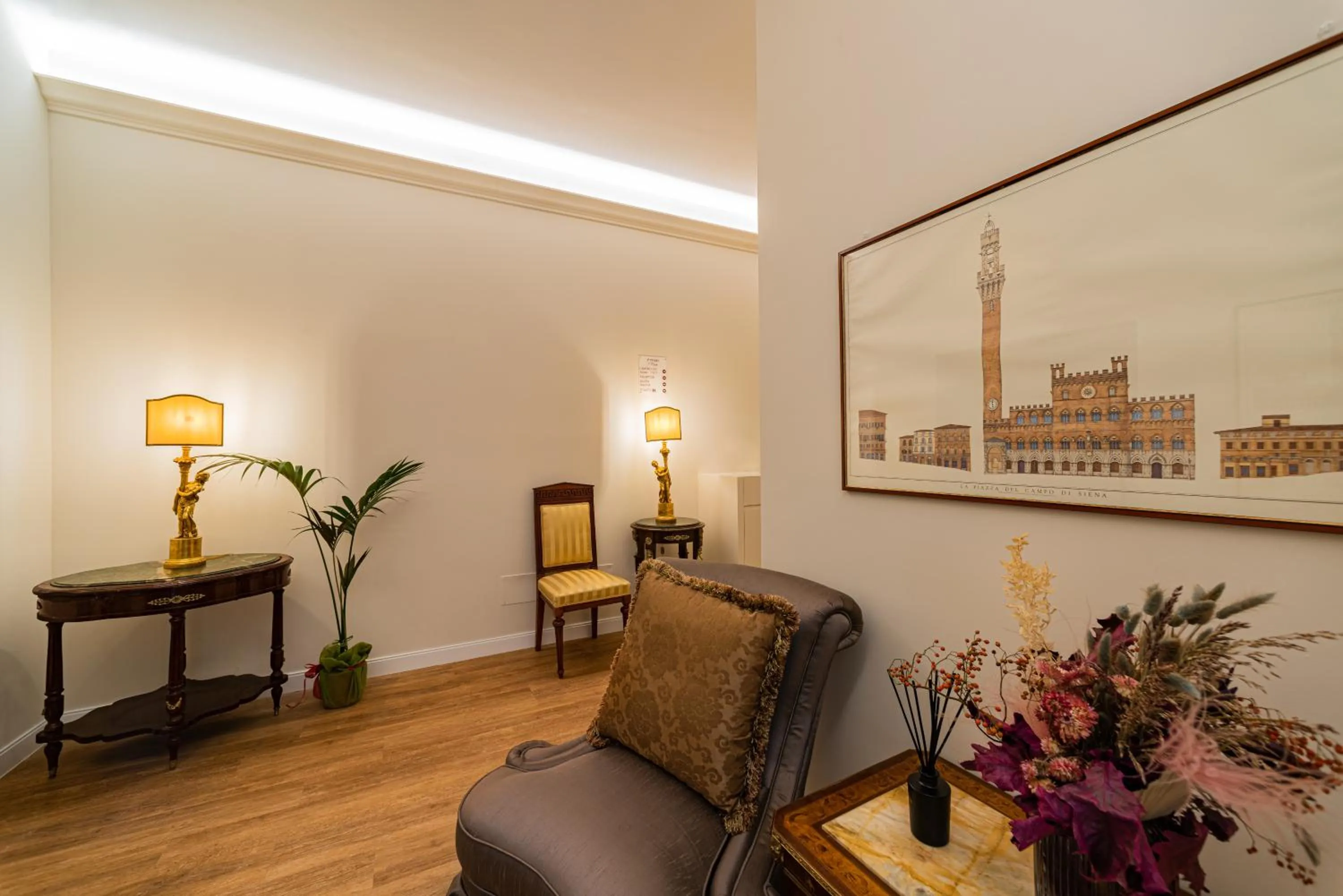 Communal lounge/ TV room in Il giardino di Pantaneto Residenza D'Epoca