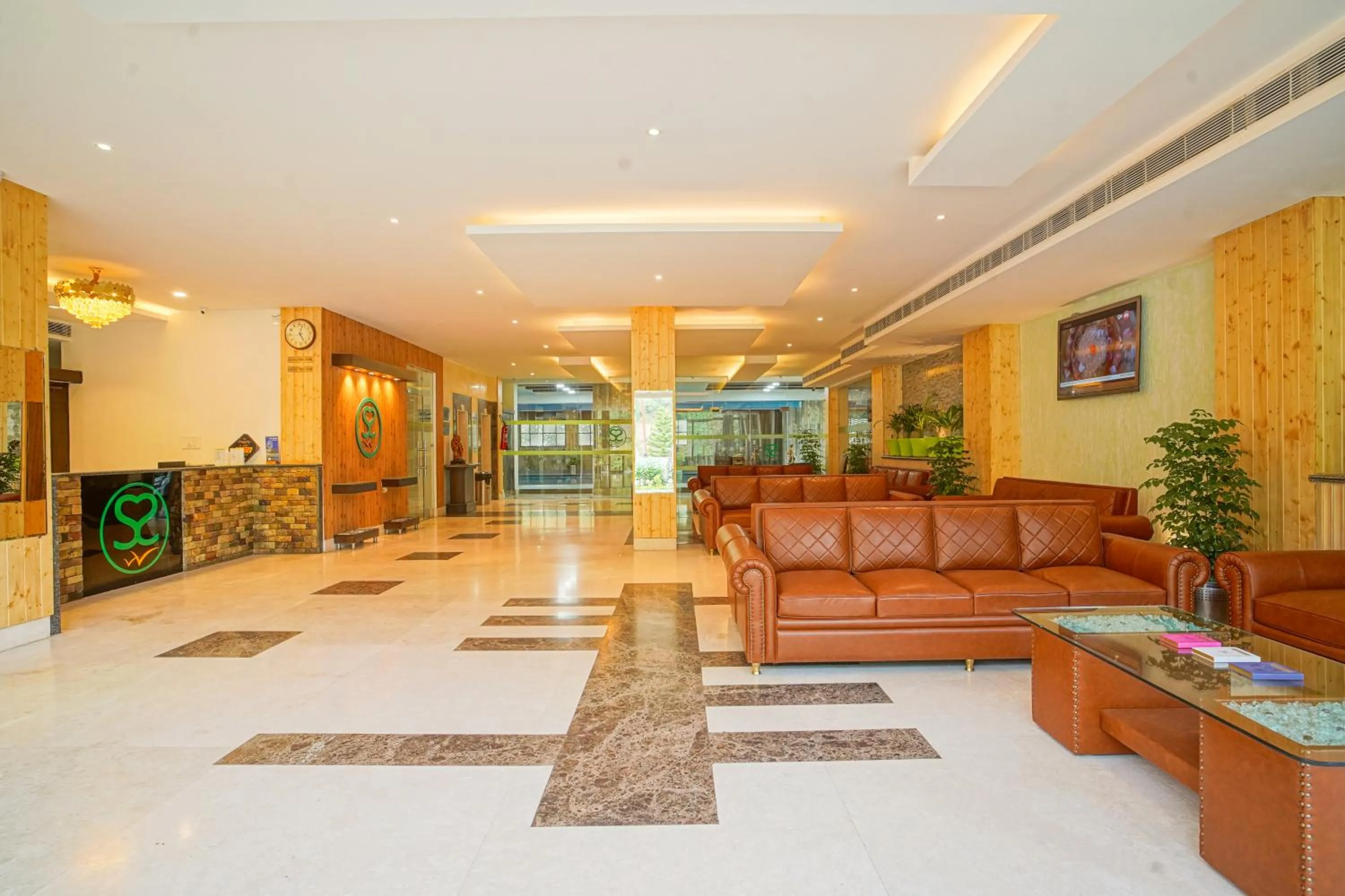 Communal lounge/ TV room in The Grand Shiva Resort and Spa