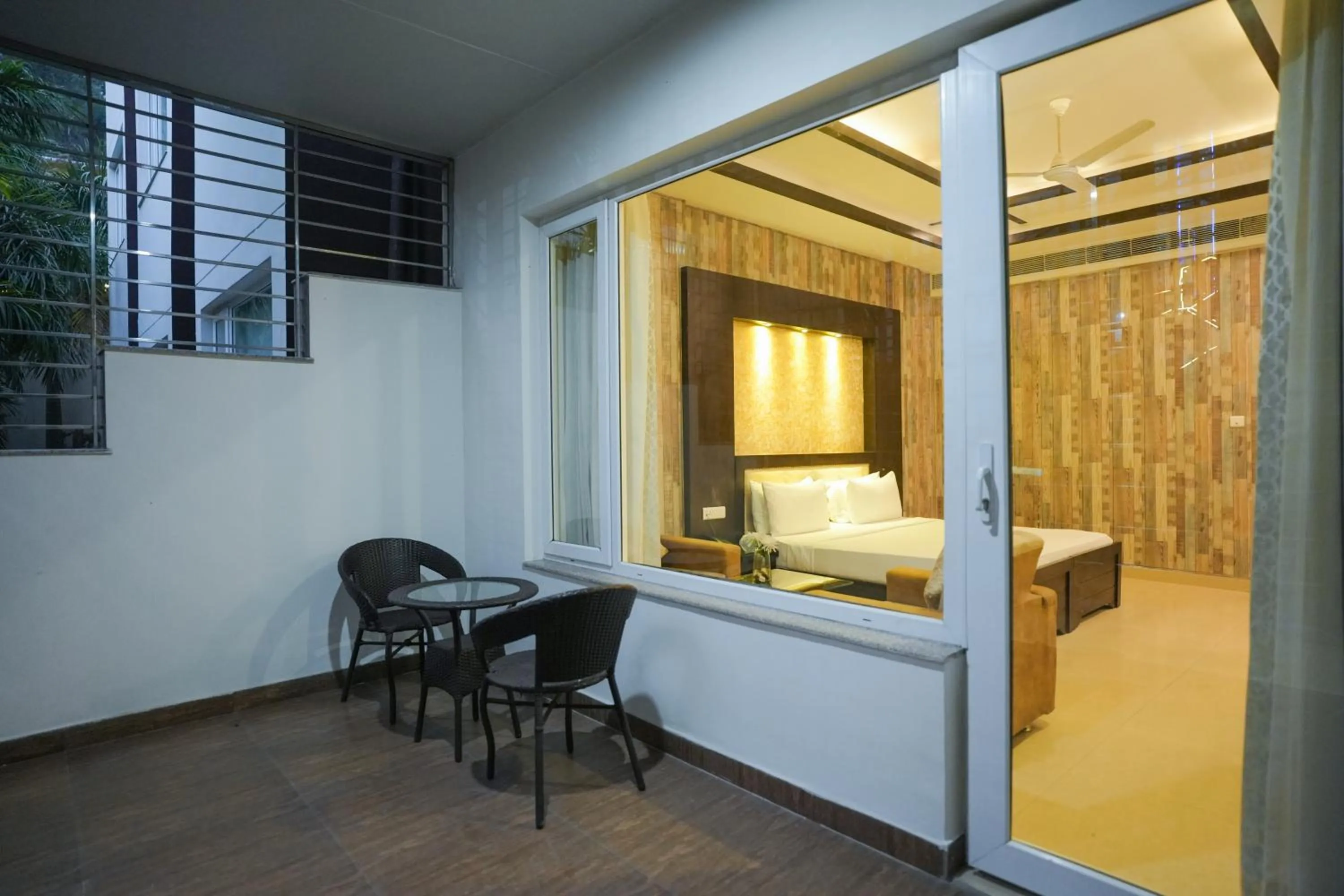 Bed in The Grand Shiva Resort and Spa