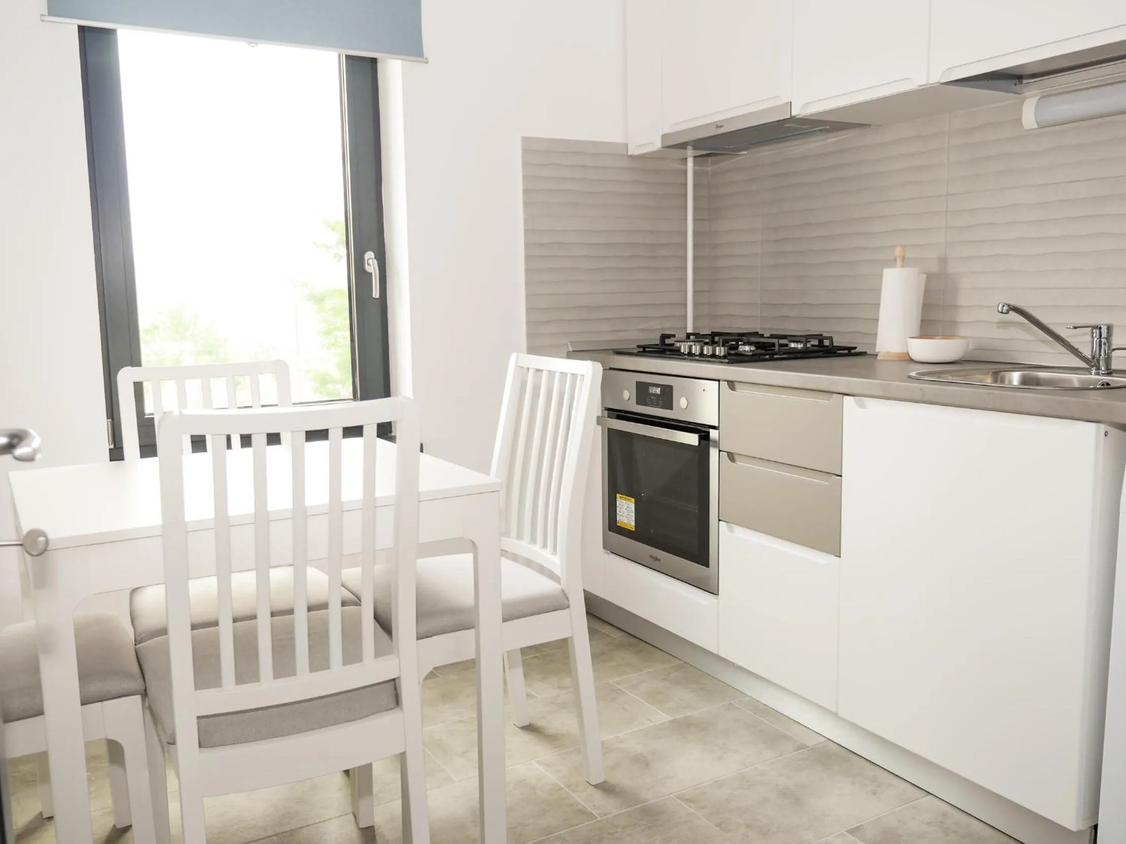 Kitchen or kitchenette in Clement Apartments