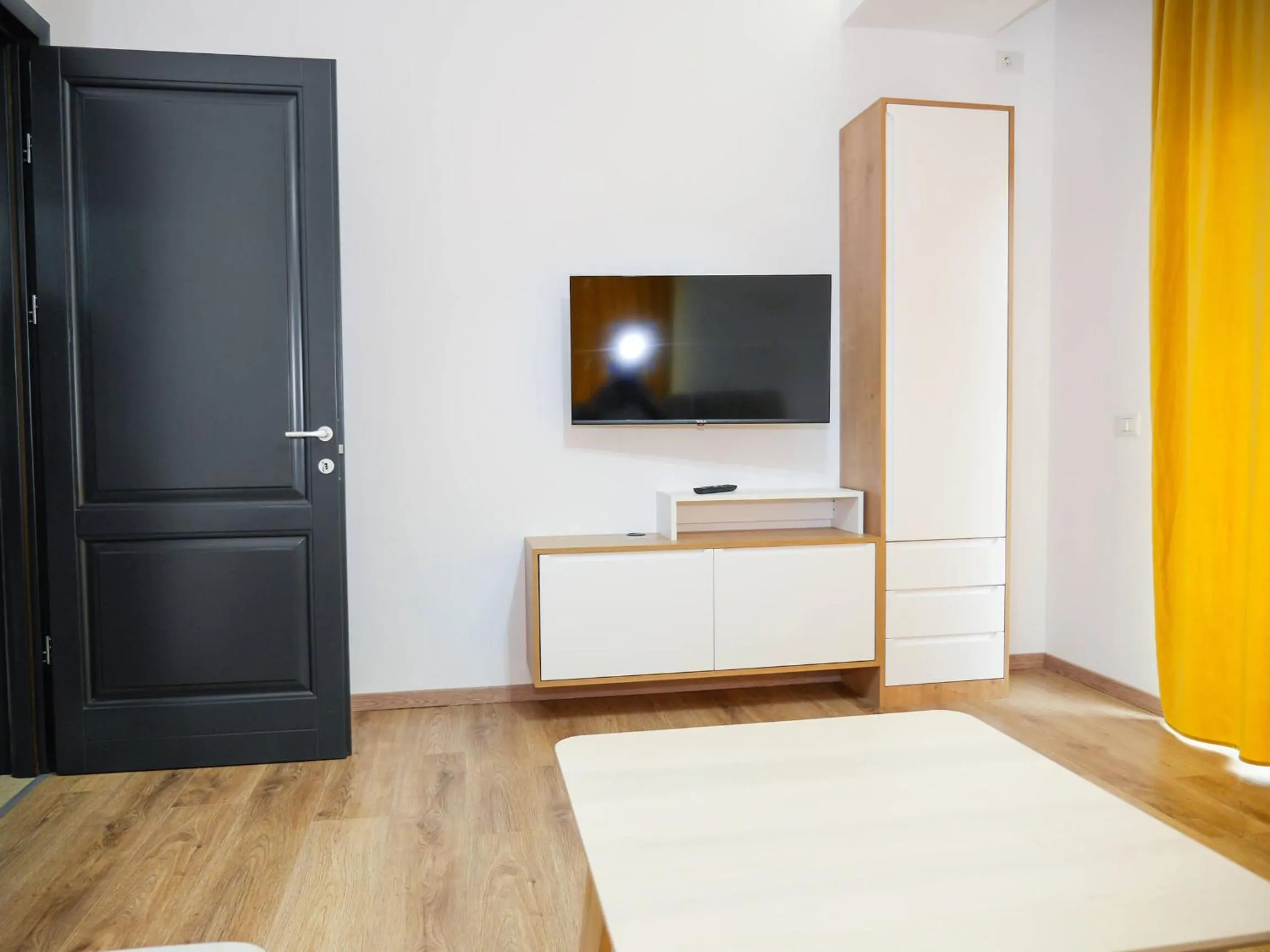 Living room, Bed in Clement Apartments