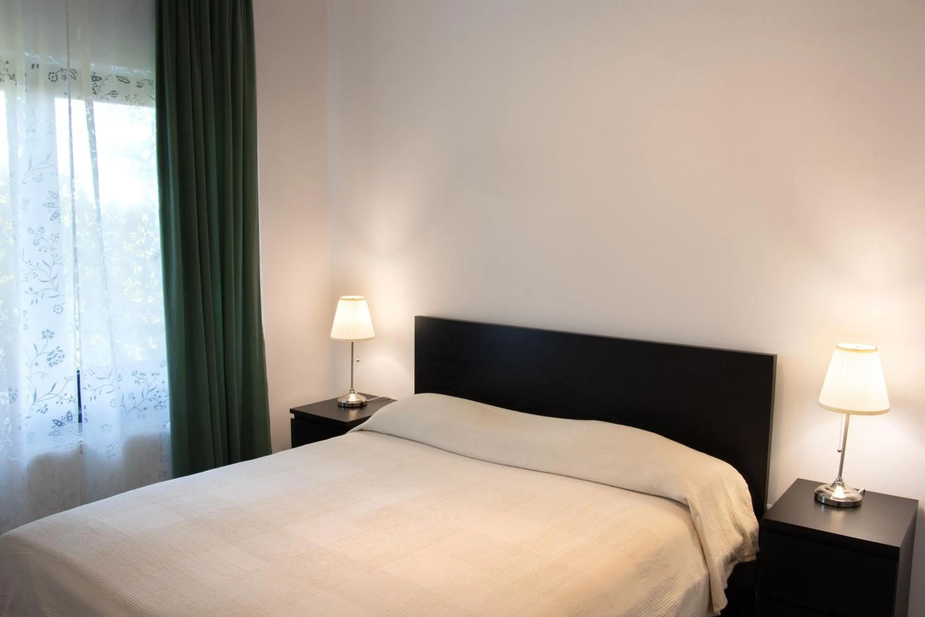 Bed in Clement Apartments