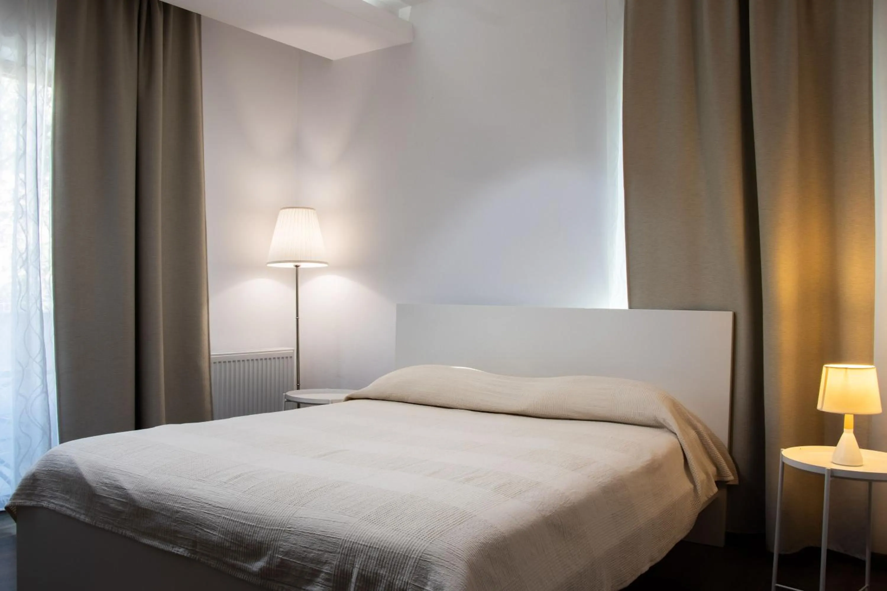 Bed in Clement Apartments