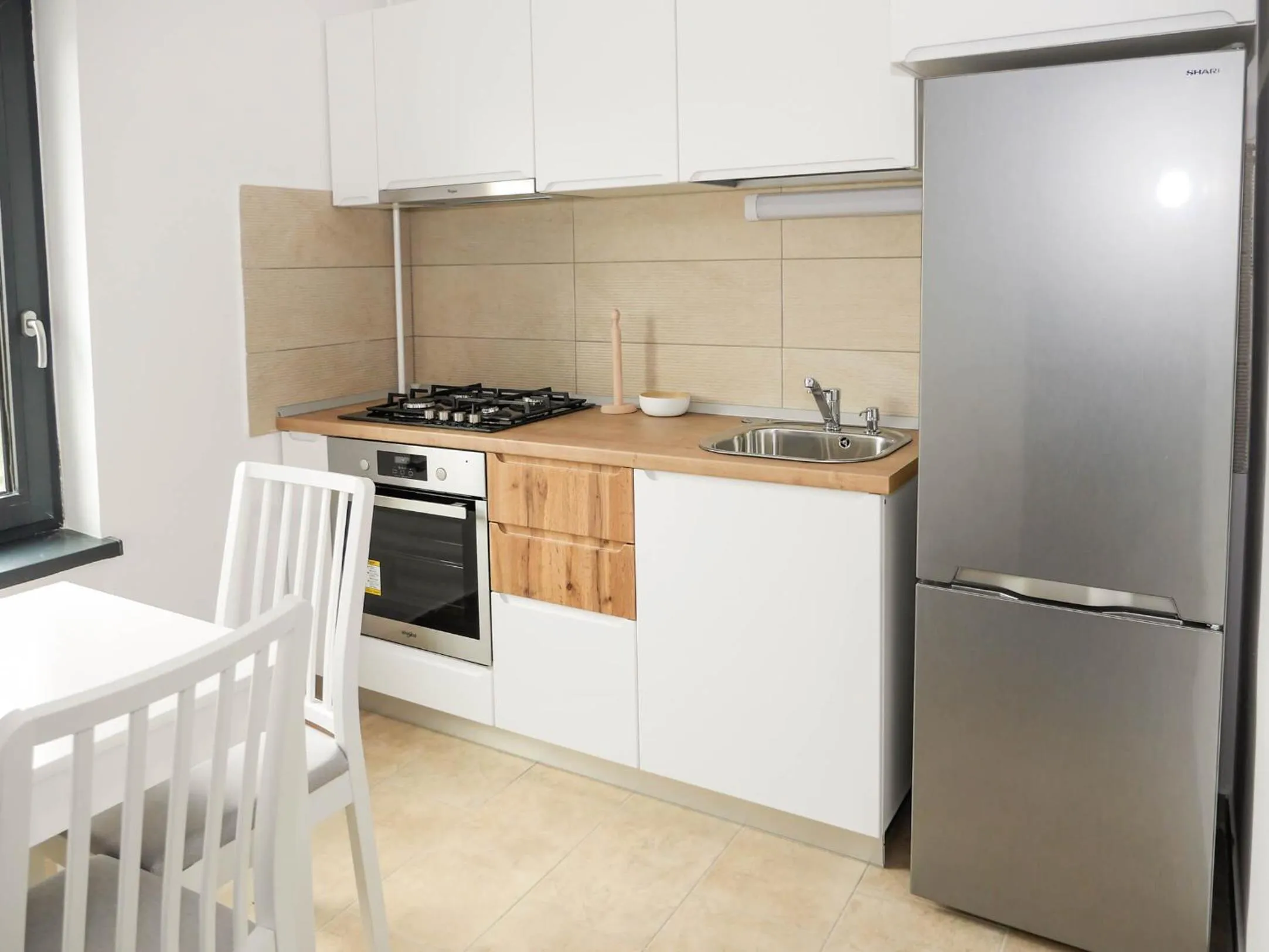 Kitchen or kitchenette in Clement Apartments