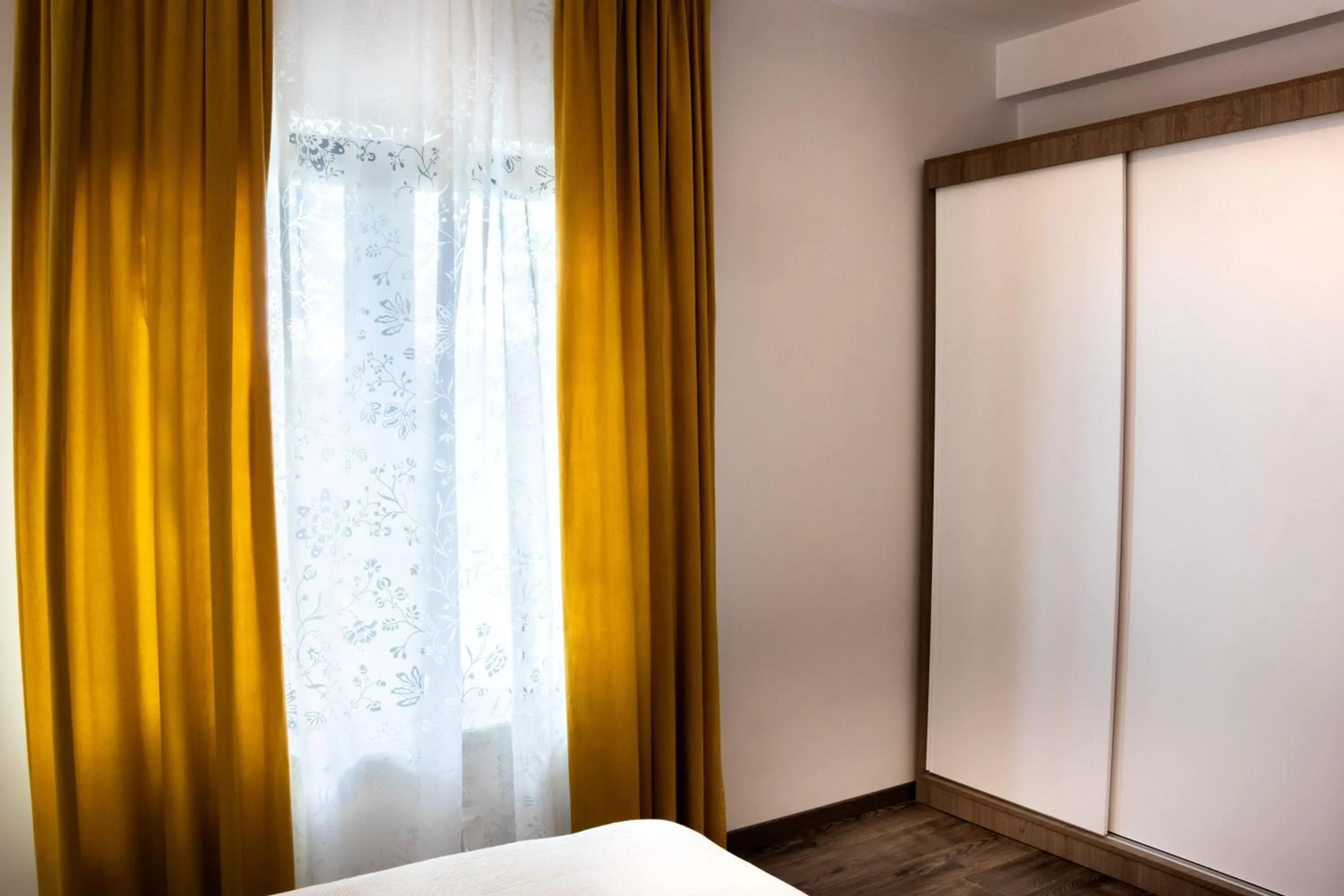 Photo of the whole room, Bed in Clement Apartments