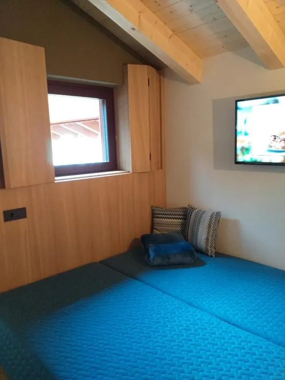 Bed in Hotel Villa Mayr Rooms & Suites