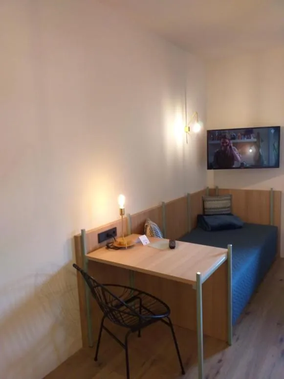 Bed in Hotel Villa Mayr Rooms & Suites