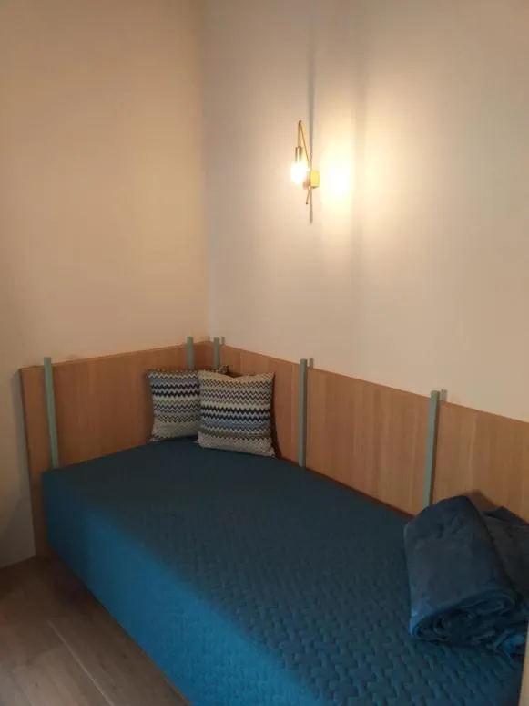 Bed in Hotel Villa Mayr Rooms & Suites