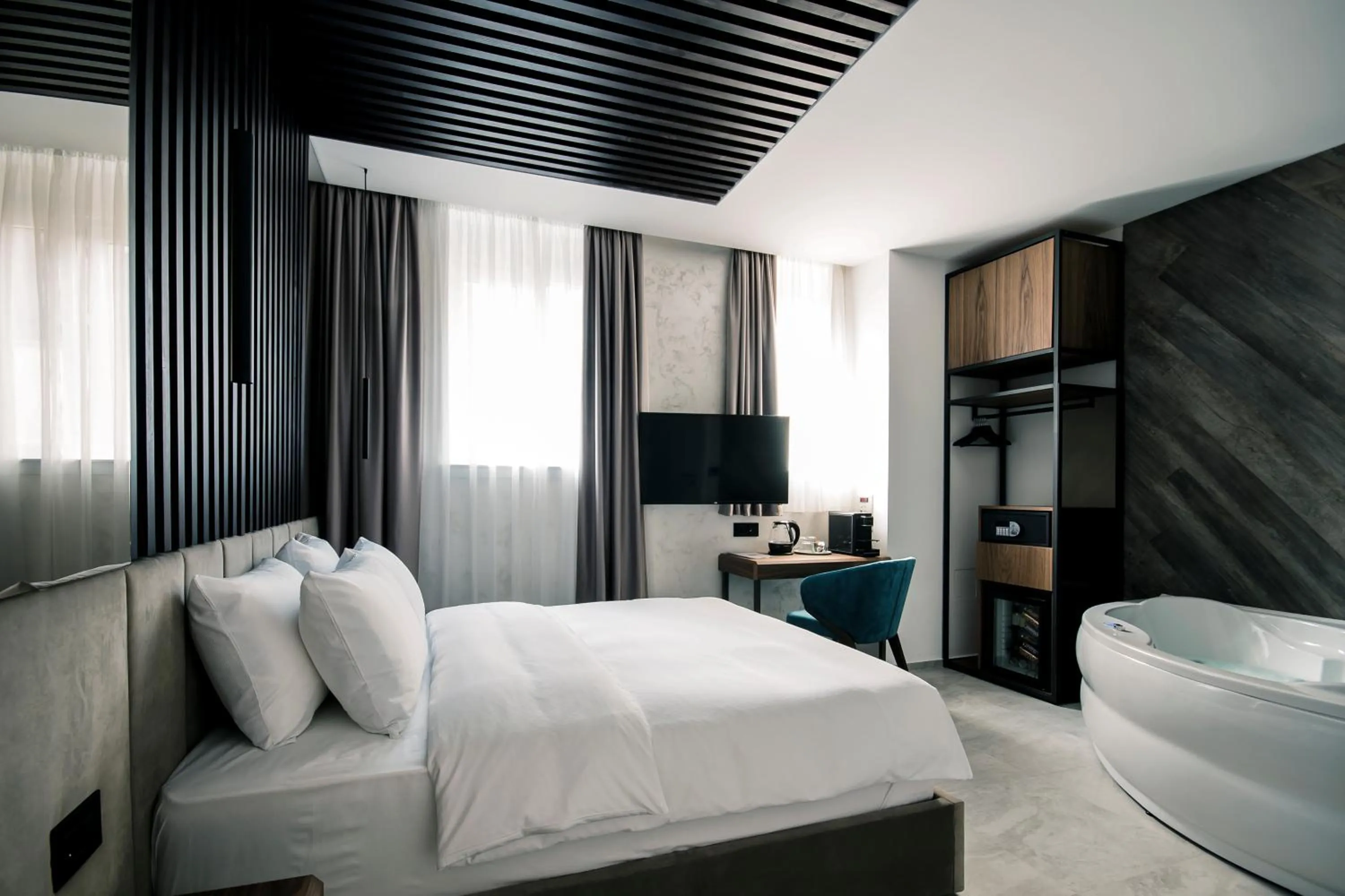 Photo of the whole room, Bed in The Location Hotel