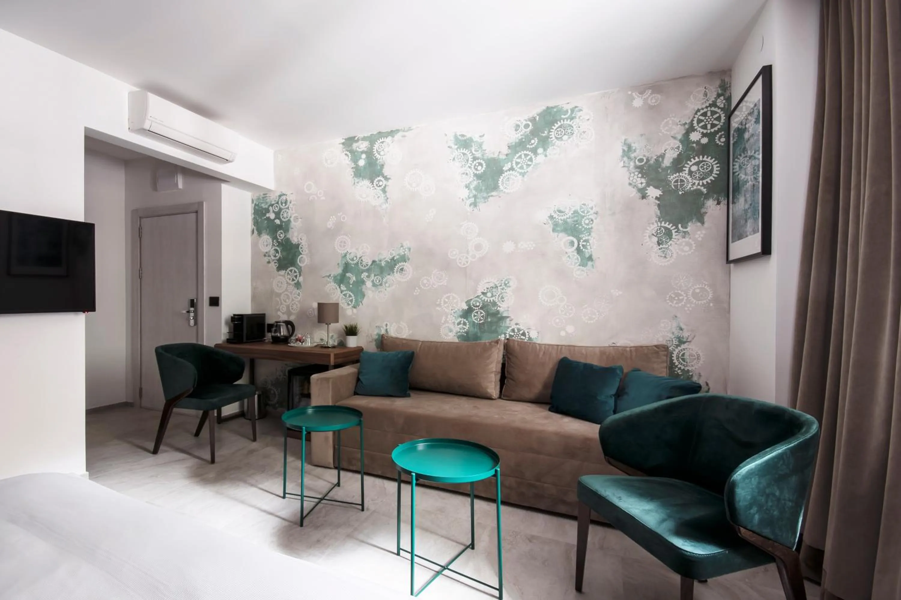 Seating area in The Location Hotel