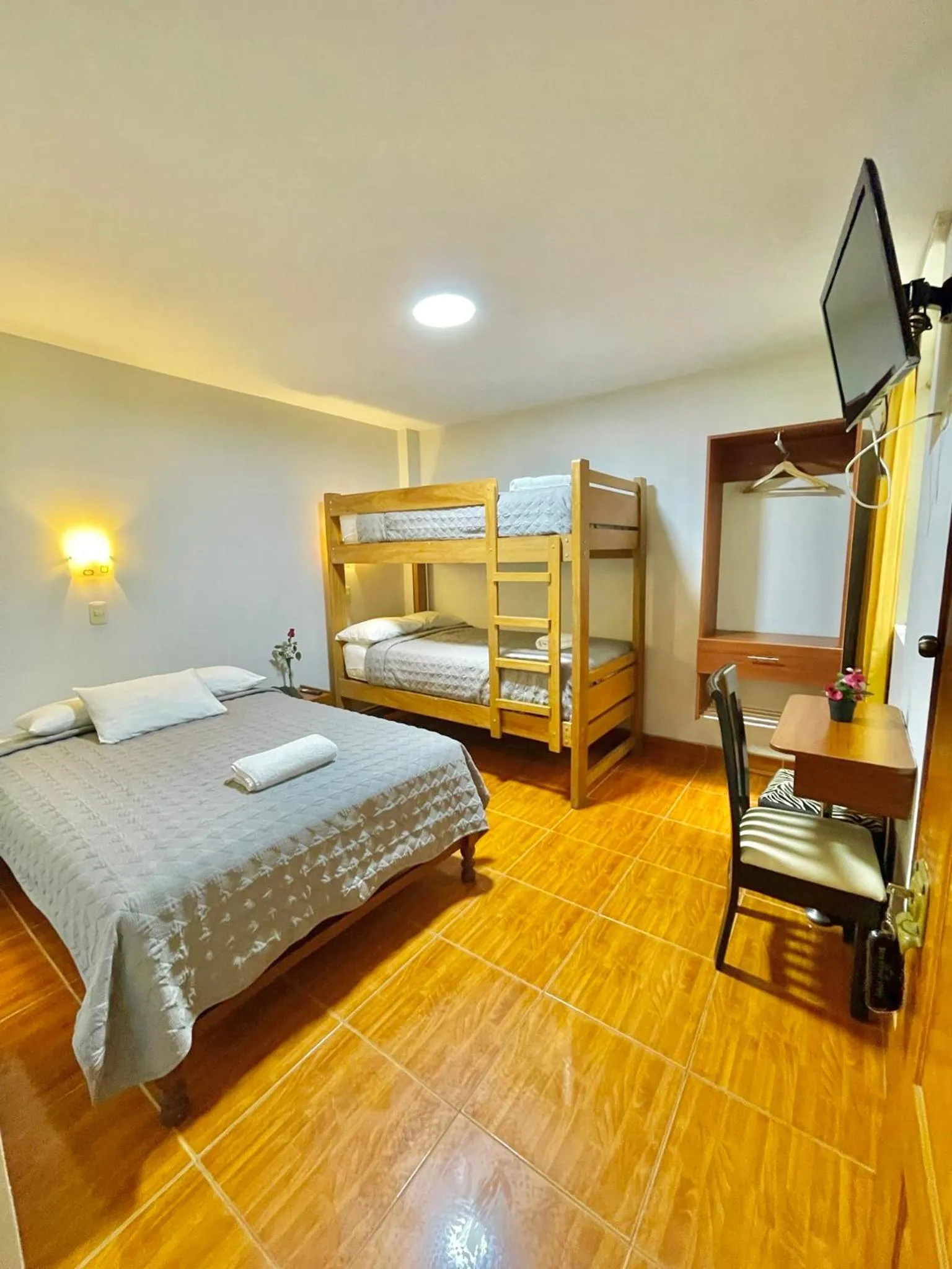 Bed in Jultom Inn Hotel & Suites