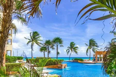 Pool view in Oceanfront Condo a Block Off 5th in Heart of Playa