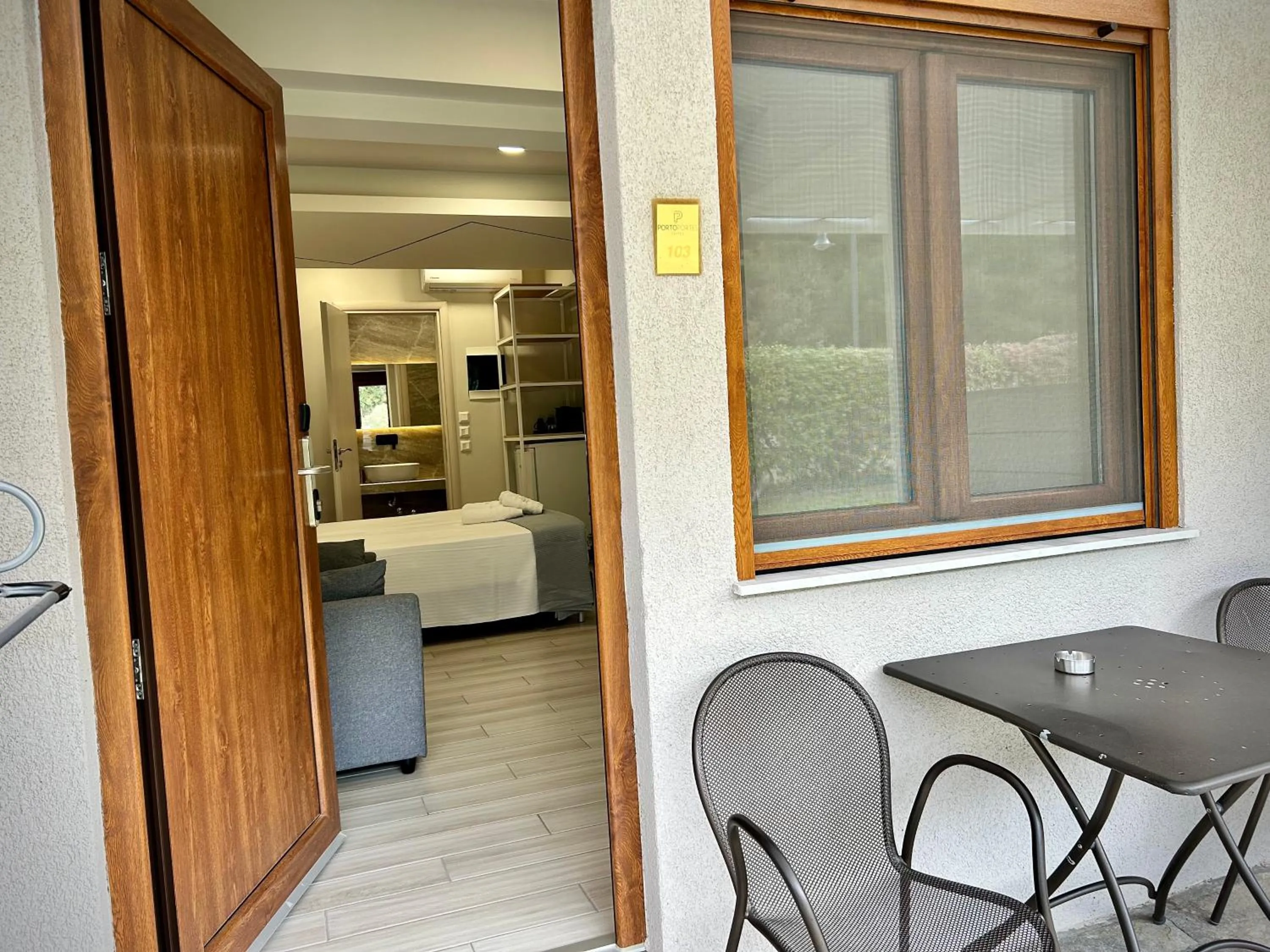 Photo of the whole room in PORTO PORTES suites