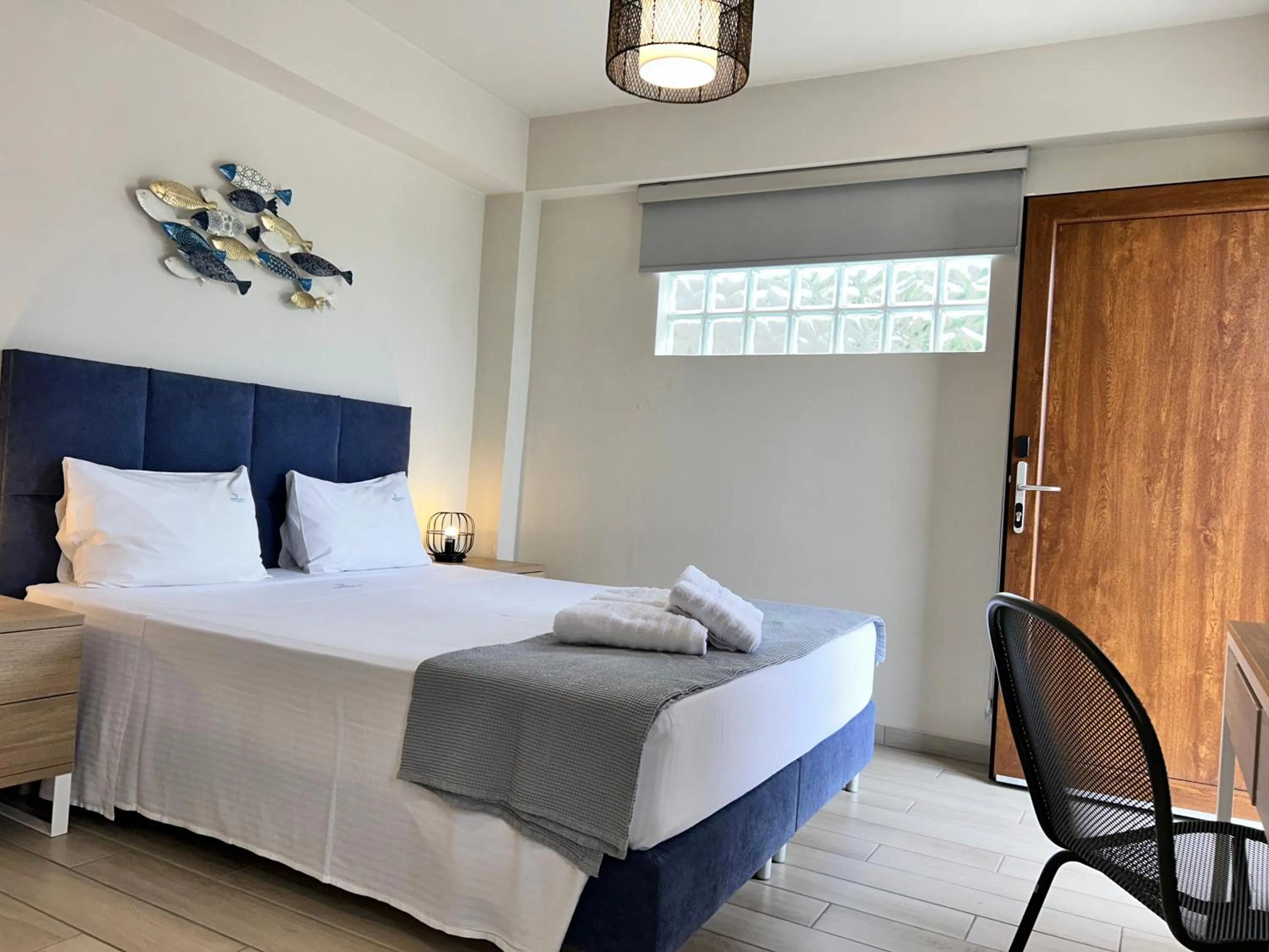 Photo of the whole room in PORTO PORTES suites