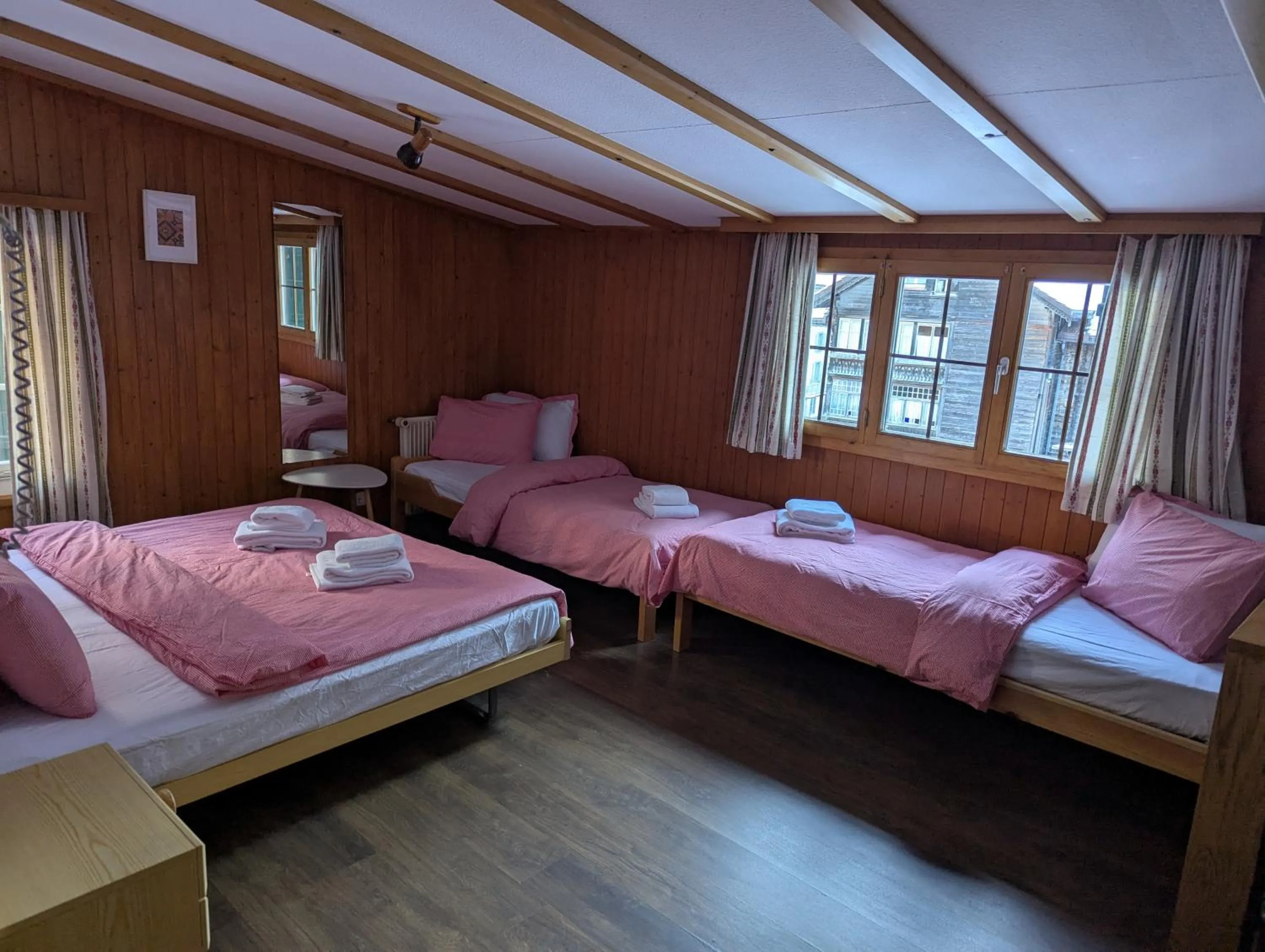 Photo of the whole room, Bed in Hotel Schützen Lauterbrunnen