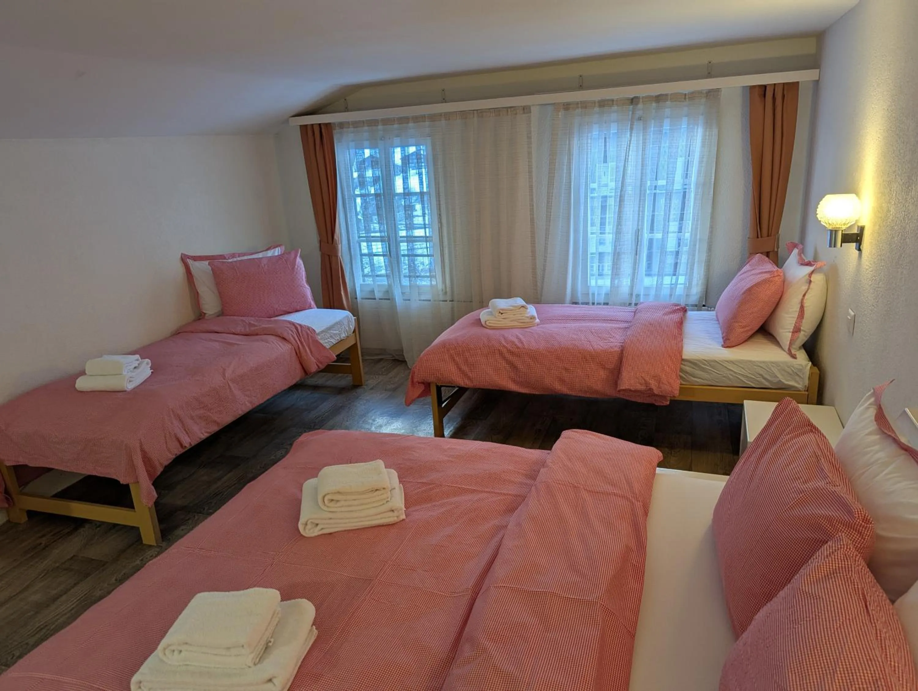 Photo of the whole room, Bed in Hotel Schützen Lauterbrunnen