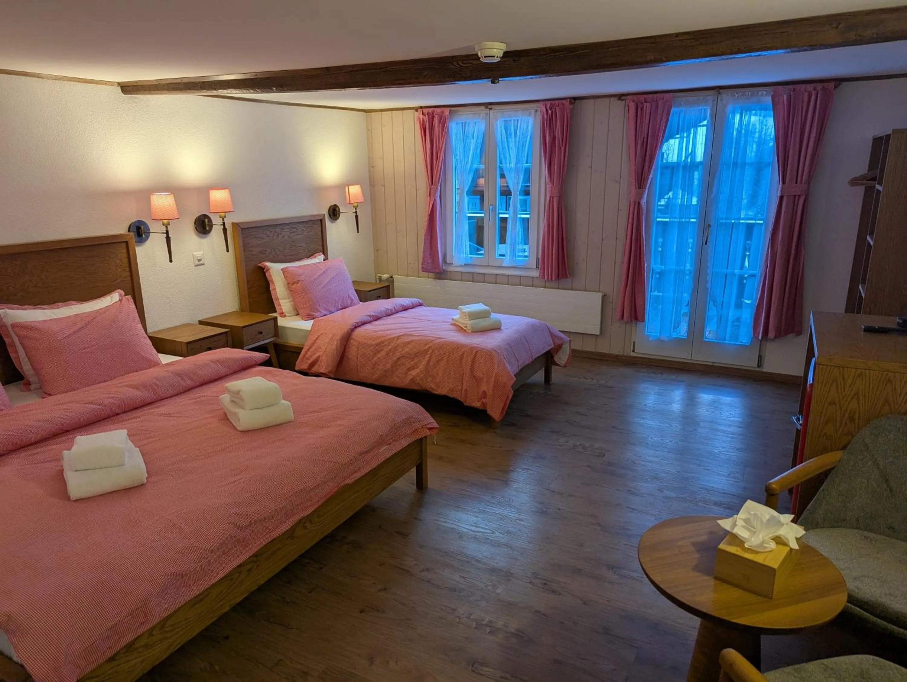 Photo of the whole room, Bed in Hotel Schützen Lauterbrunnen