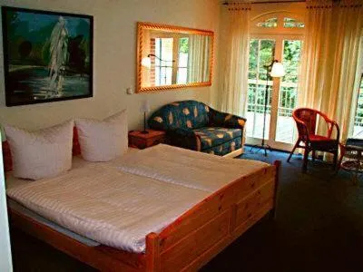 Photo of the whole room, Bed in Landhotel Gustav