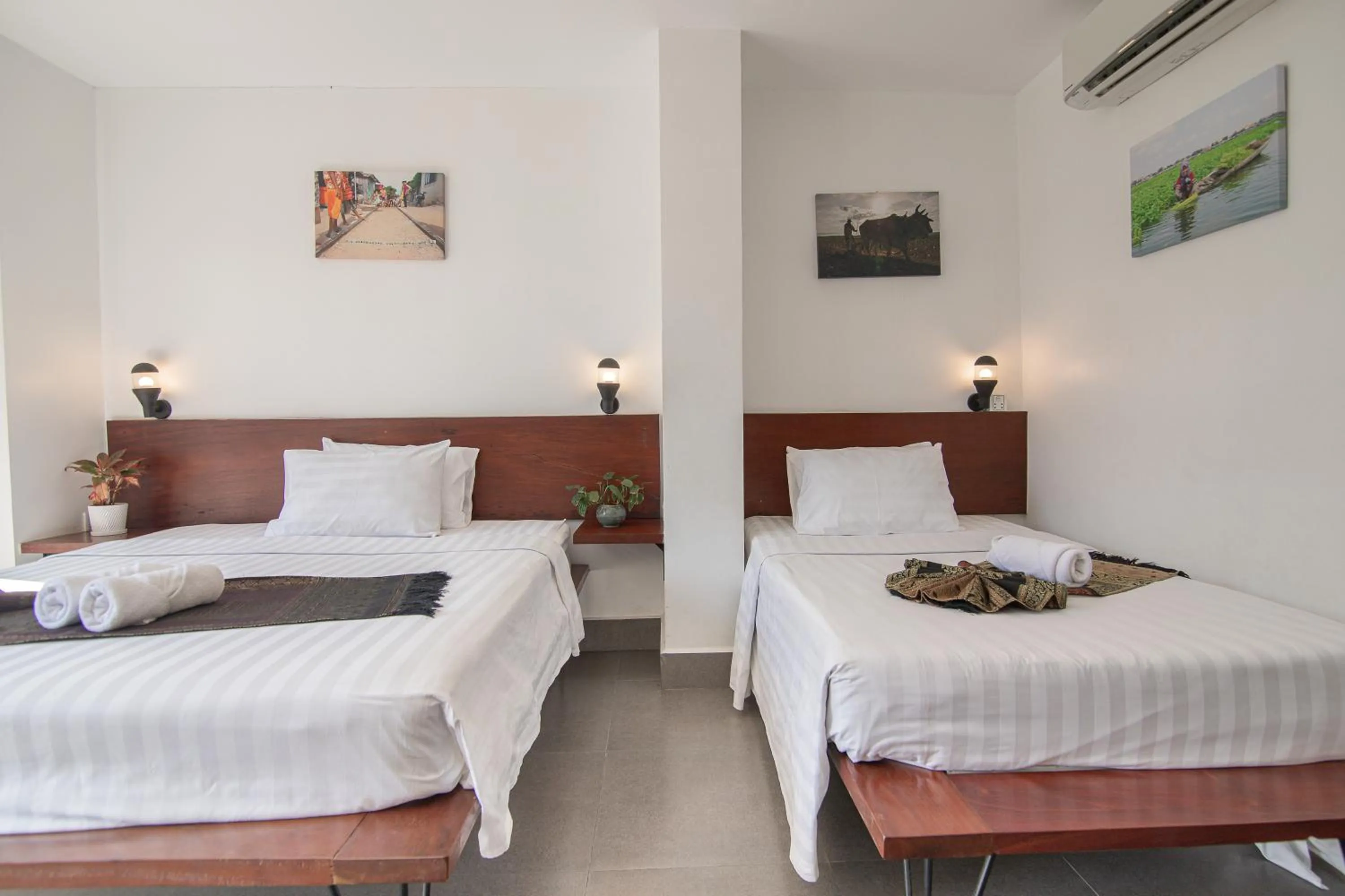 Photo of the whole room, Bed in Pooltop Phnom Penh