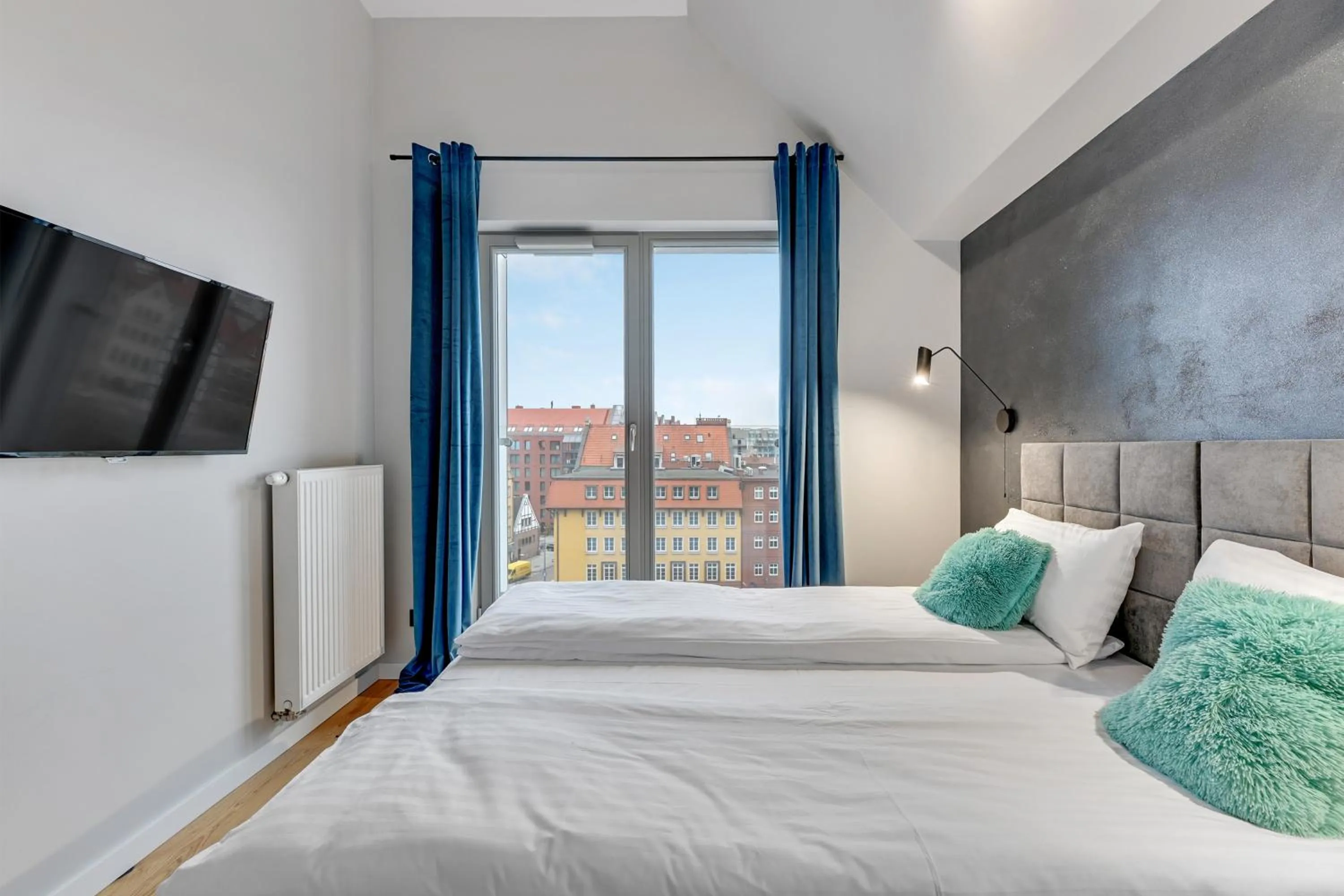 Bed in GRANO APARTMENTS Gdańsk Residence SPA & Wellness - GRANO APARTMENTS Gdańsk Old Town SPA & Wellness