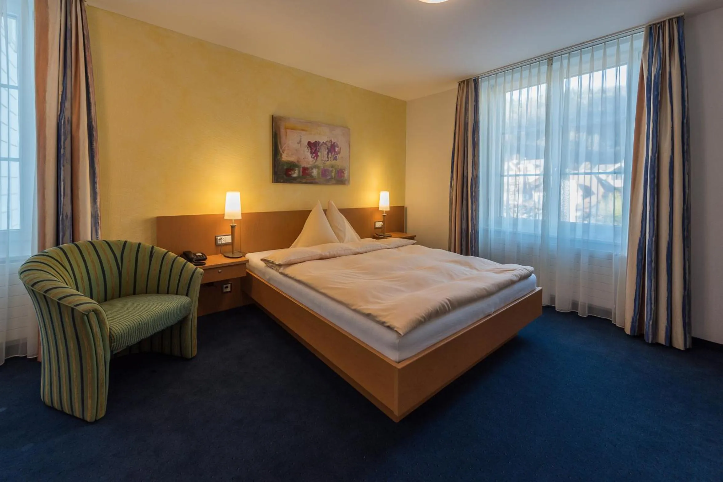 Photo of the whole room, Bed in Parkhotel Gunten – Beach & Spa