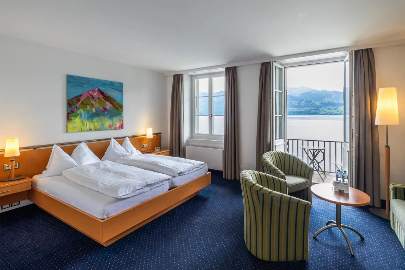 Balcony/Terrace, Bed in Parkhotel Gunten – Beach & Spa