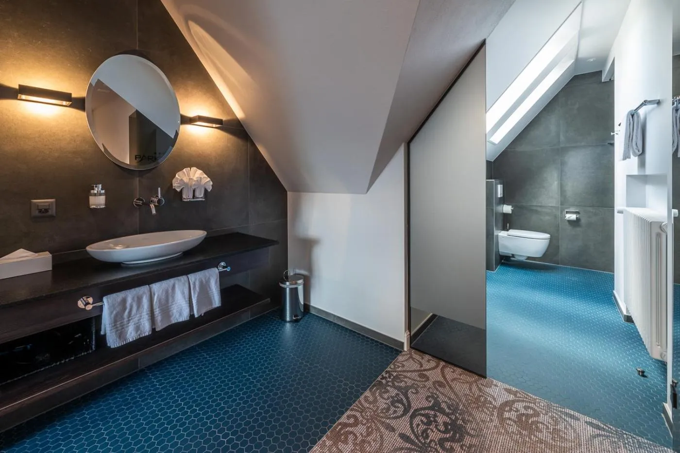Bathroom, Bed in Parkhotel Gunten – Beach & Spa