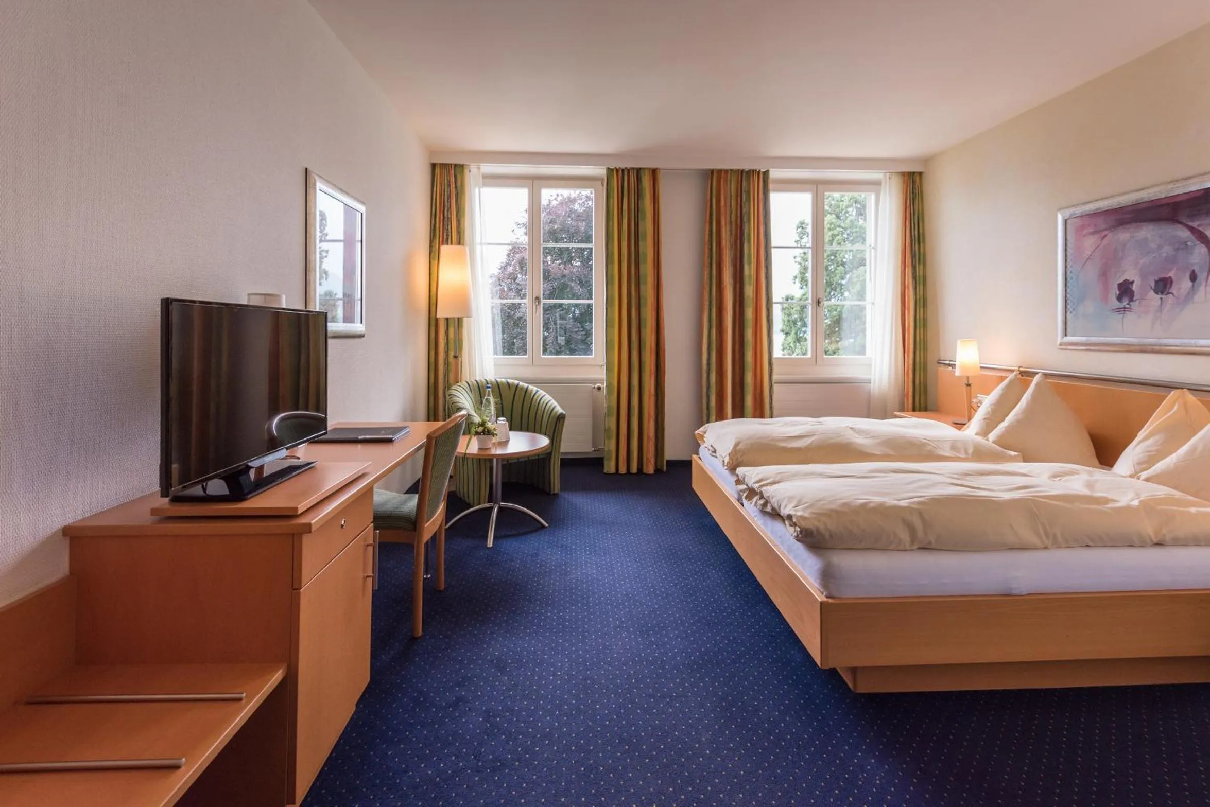 Photo of the whole room, Bed in Parkhotel Gunten – Beach & Spa