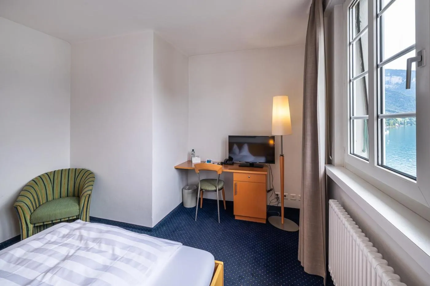 Photo of the whole room, Bed in Parkhotel Gunten – Beach & Spa