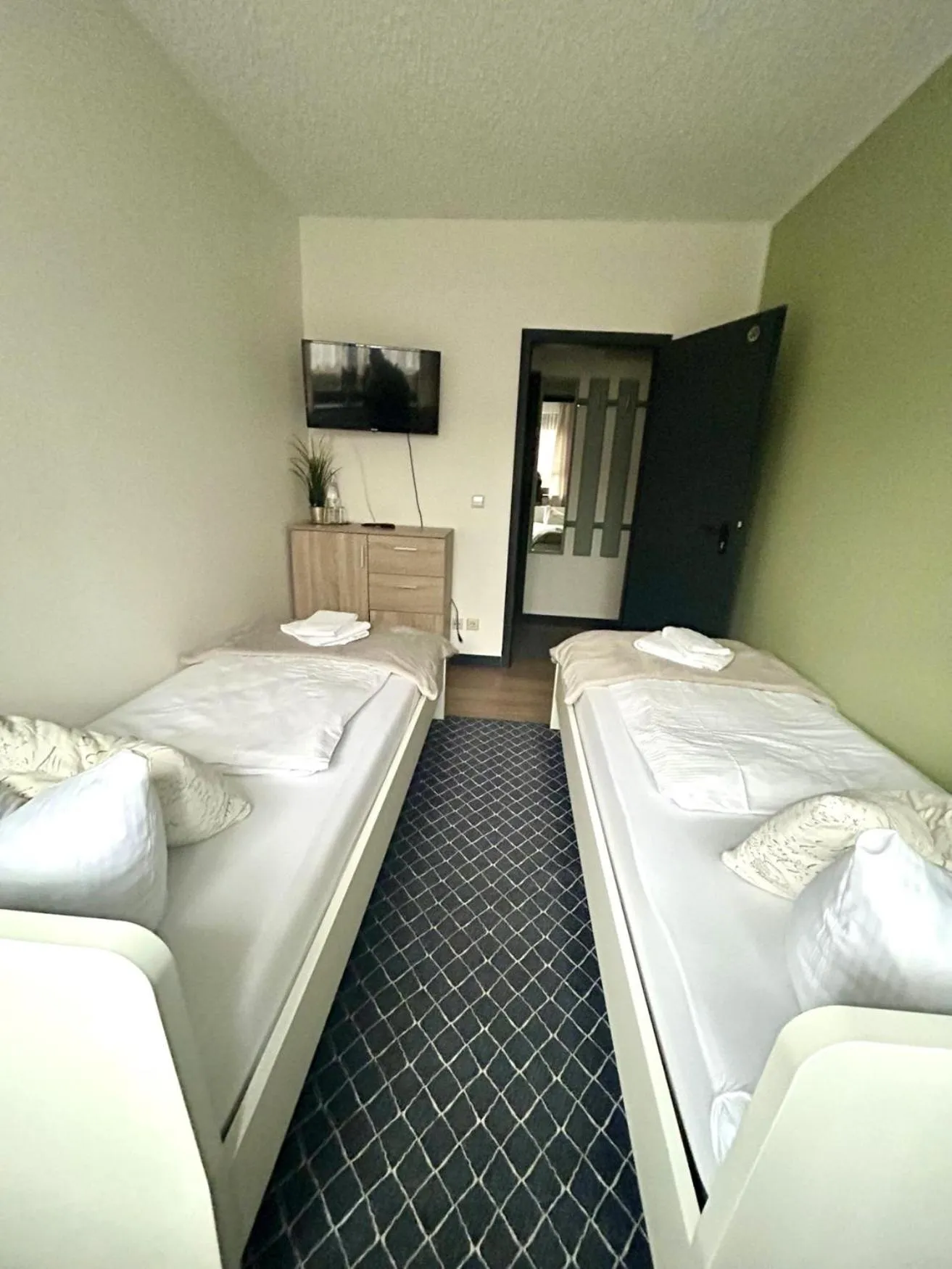 Bed in Bestwaner Hotel