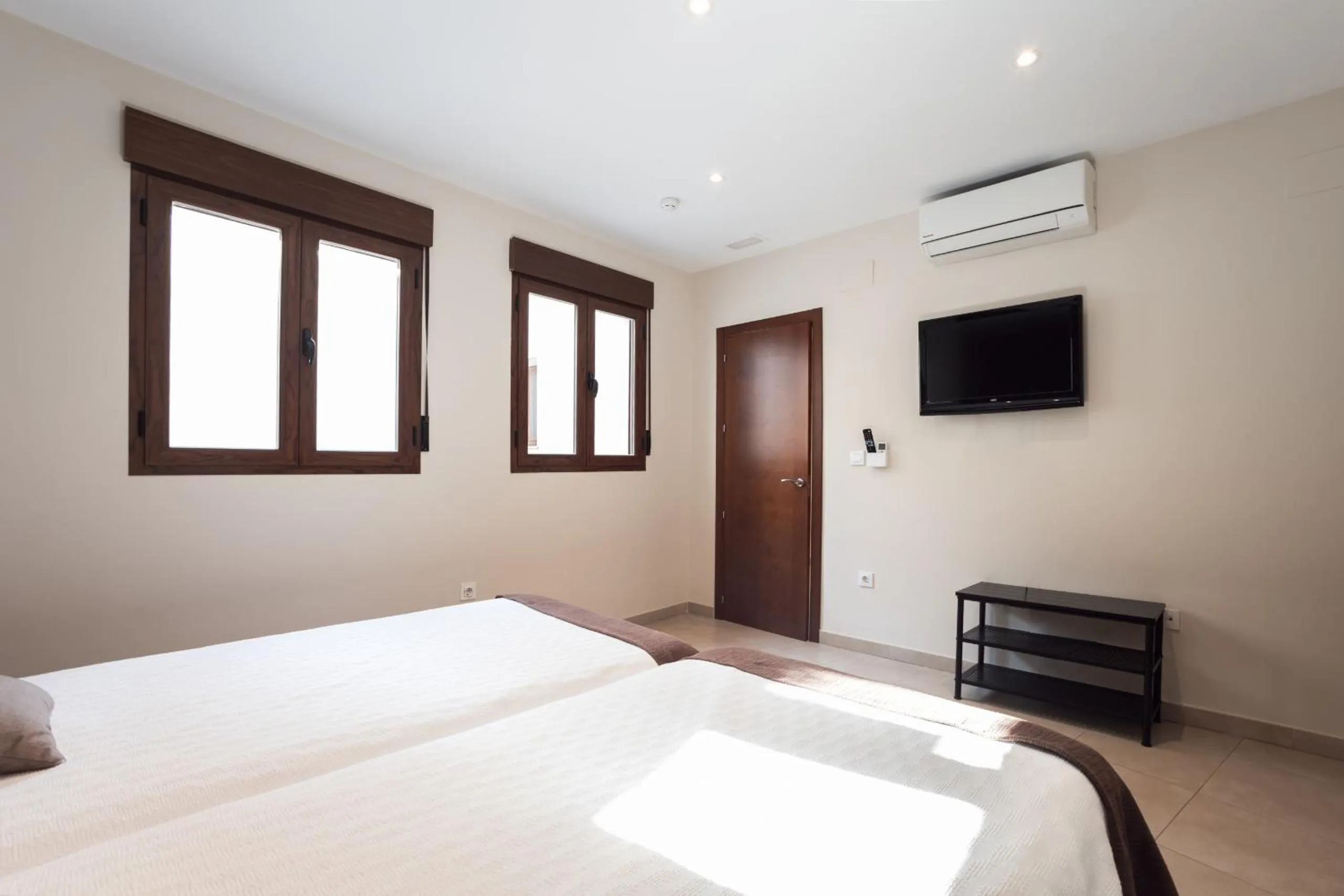 Bed in Apartamentos Reyes Católicos