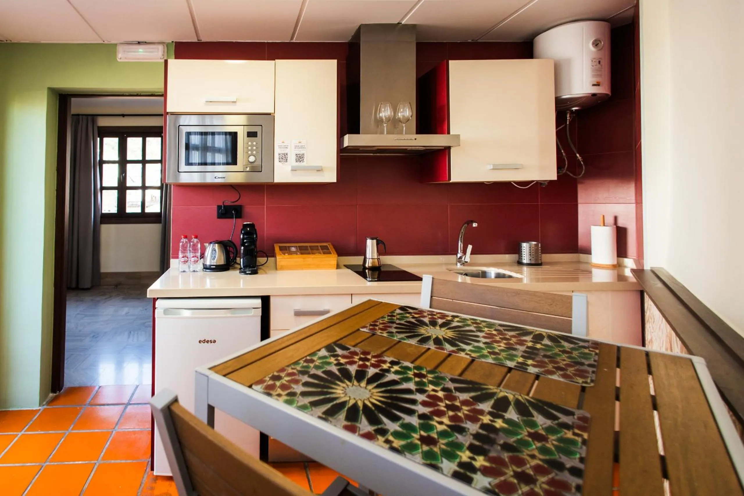 Kitchen or kitchenette in Apartamentos Reyes Católicos