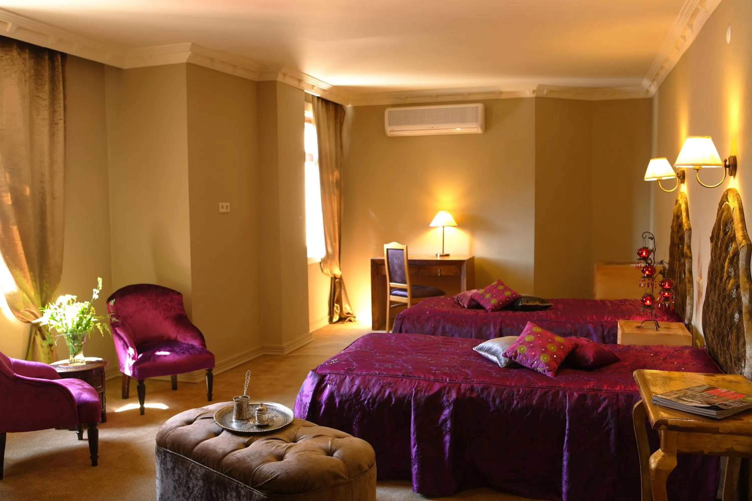 Bed in ÂLÂ HAN BOUTIQUE HOTEL