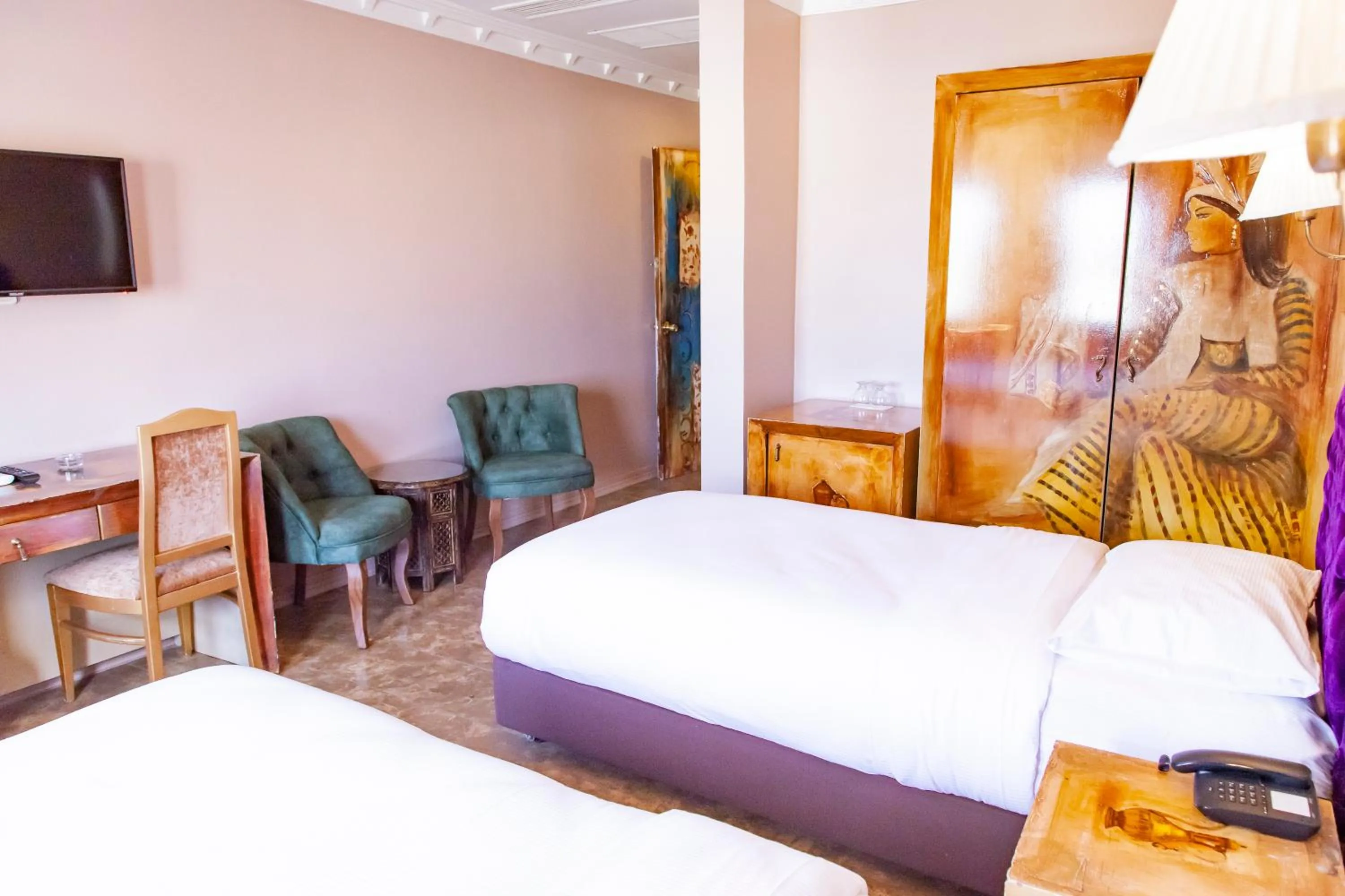 Bed in ÂLÂ HAN BOUTIQUE HOTEL