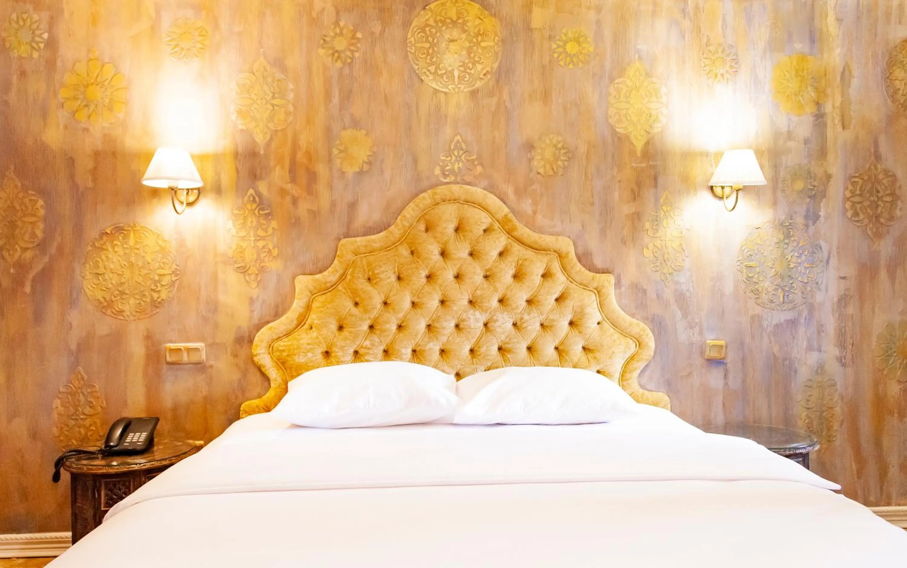 Bed in ÂLÂ HAN BOUTIQUE HOTEL