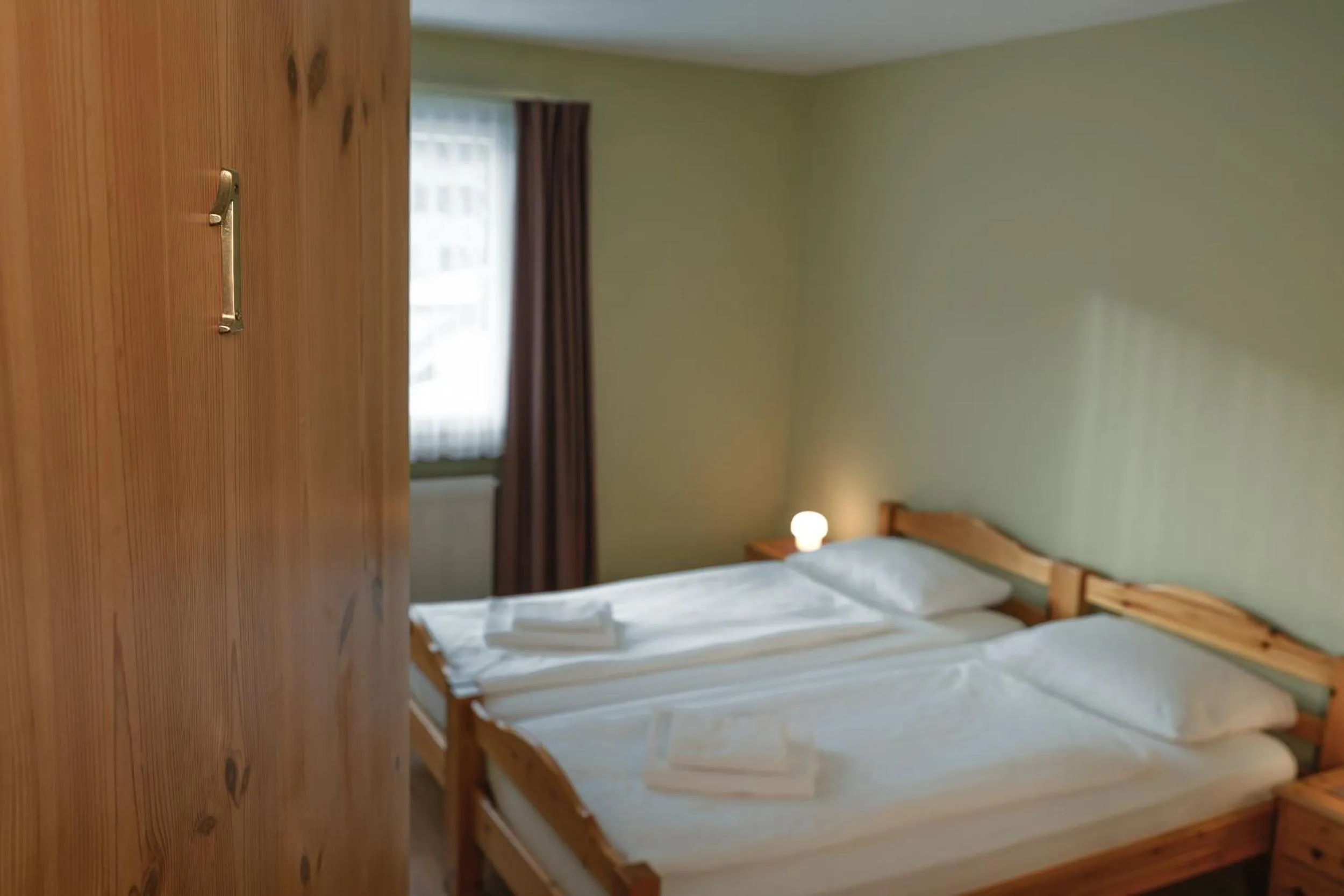 Bed in Hotel Guidon Zimmer