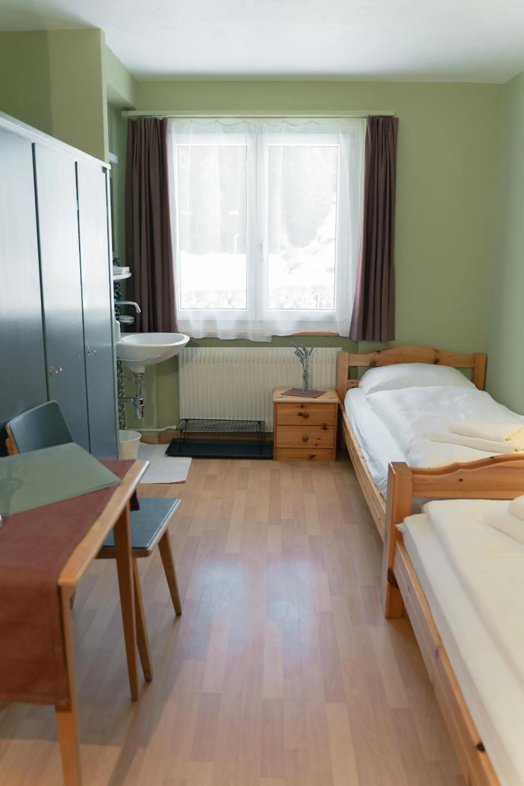 Bed in Hotel Guidon Zimmer