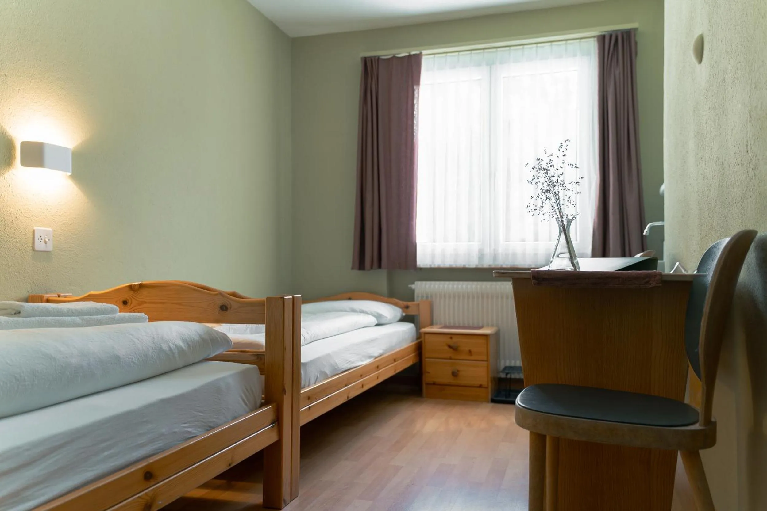Bed in Hotel Guidon Zimmer