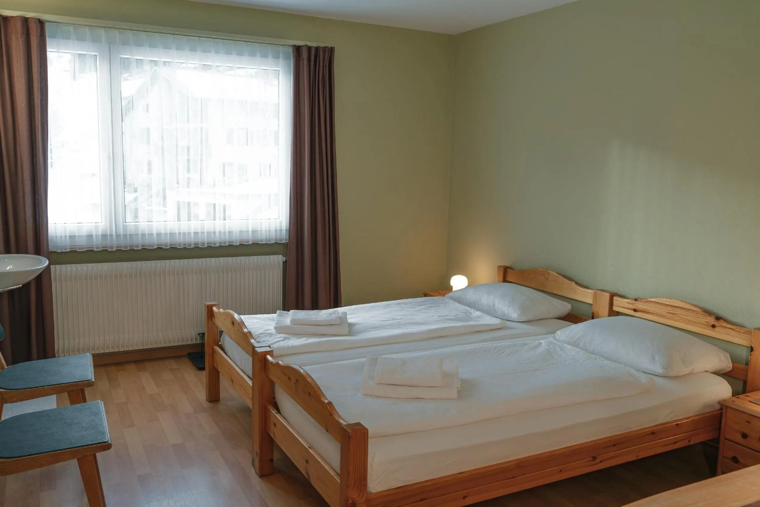 Bed in Hotel Guidon Zimmer