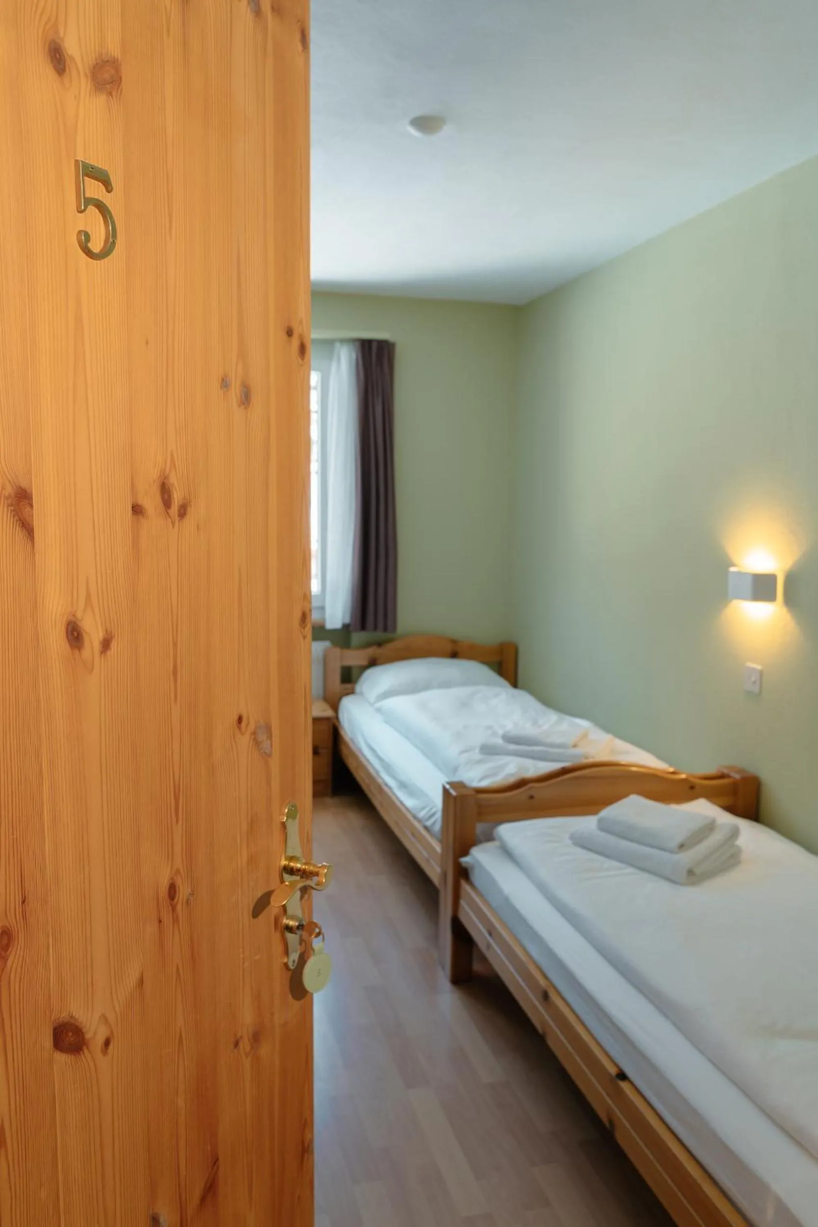 Bed in Hotel Guidon Zimmer