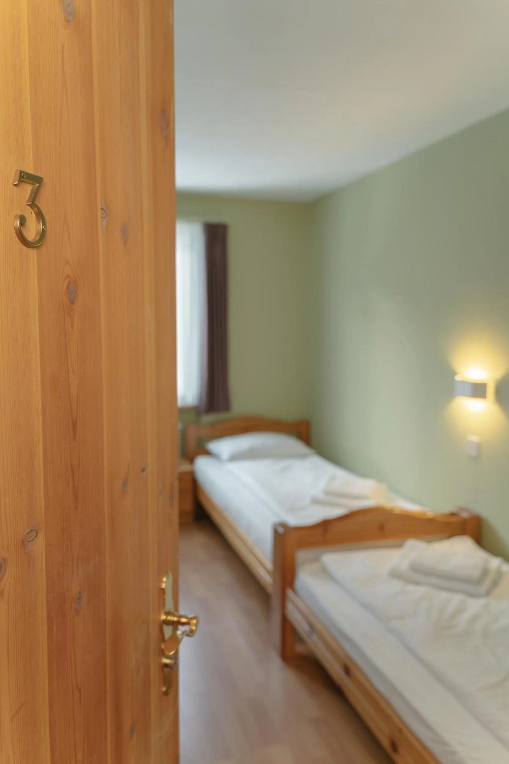 Bed in Hotel Guidon Zimmer