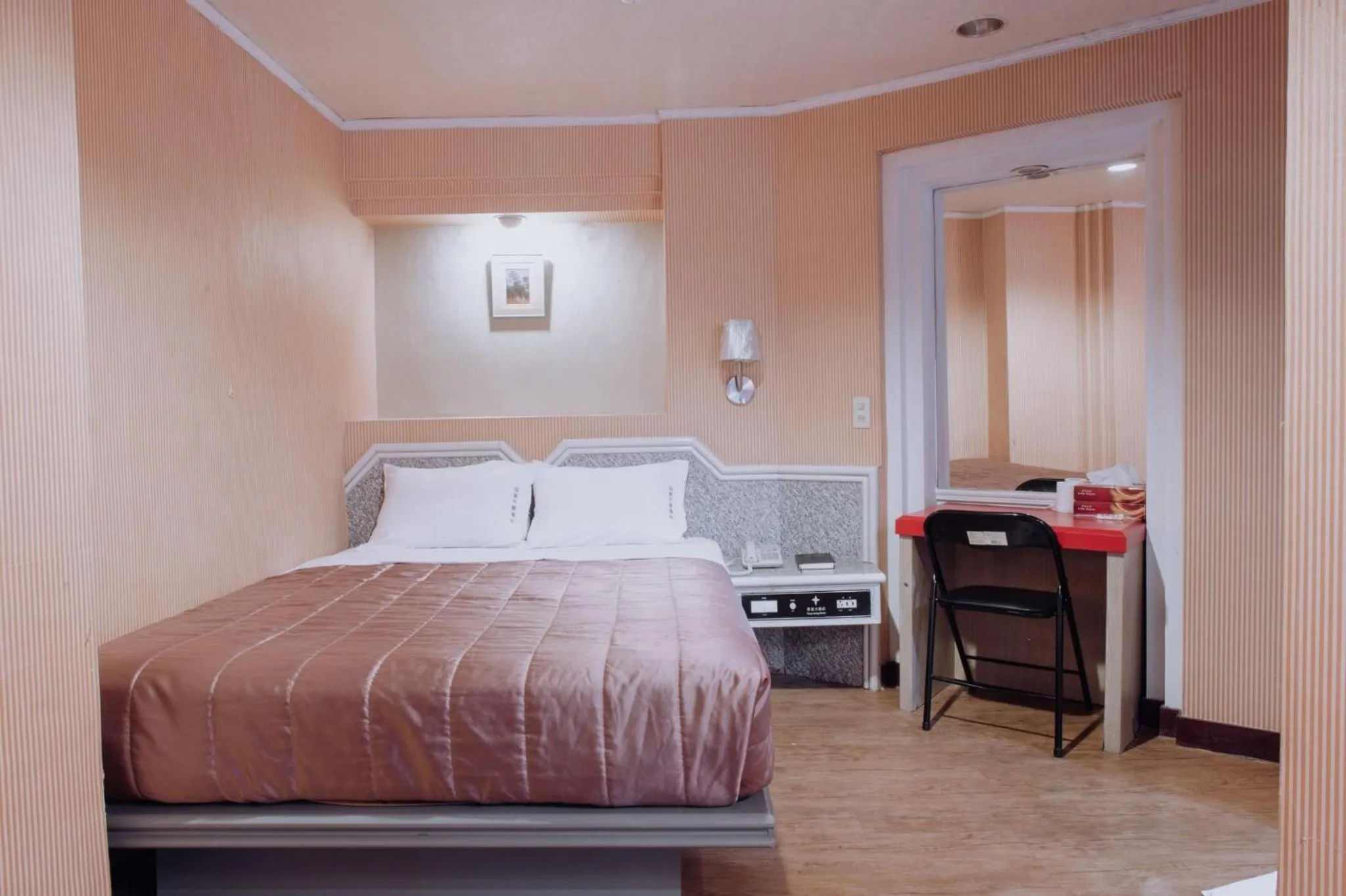 Bed in Tong Hsin Hotel