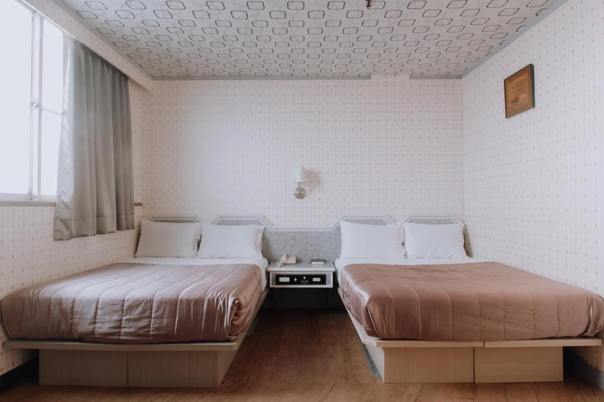 Bed in Tong Hsin Hotel