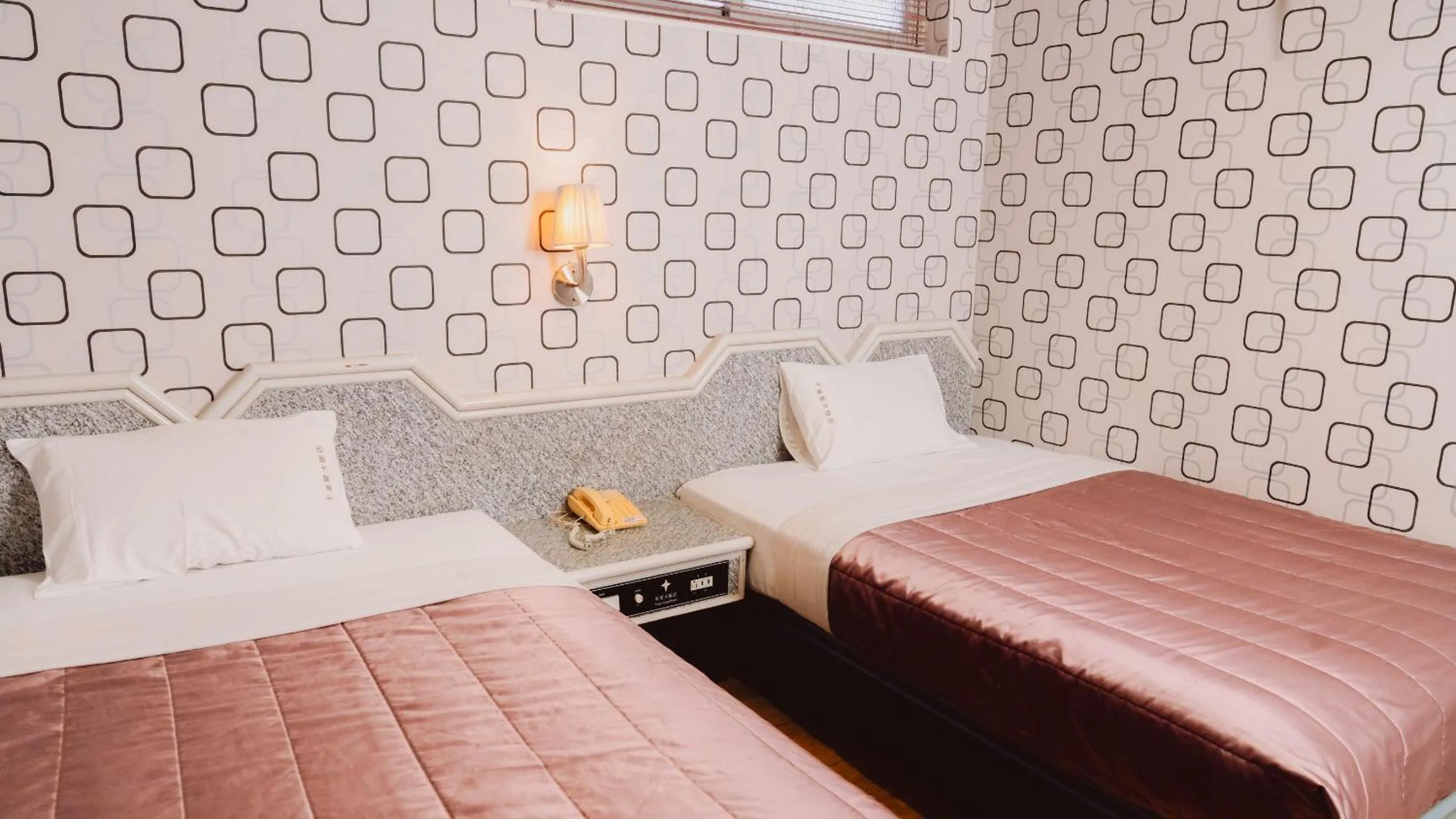 Bed in Tong Hsin Hotel