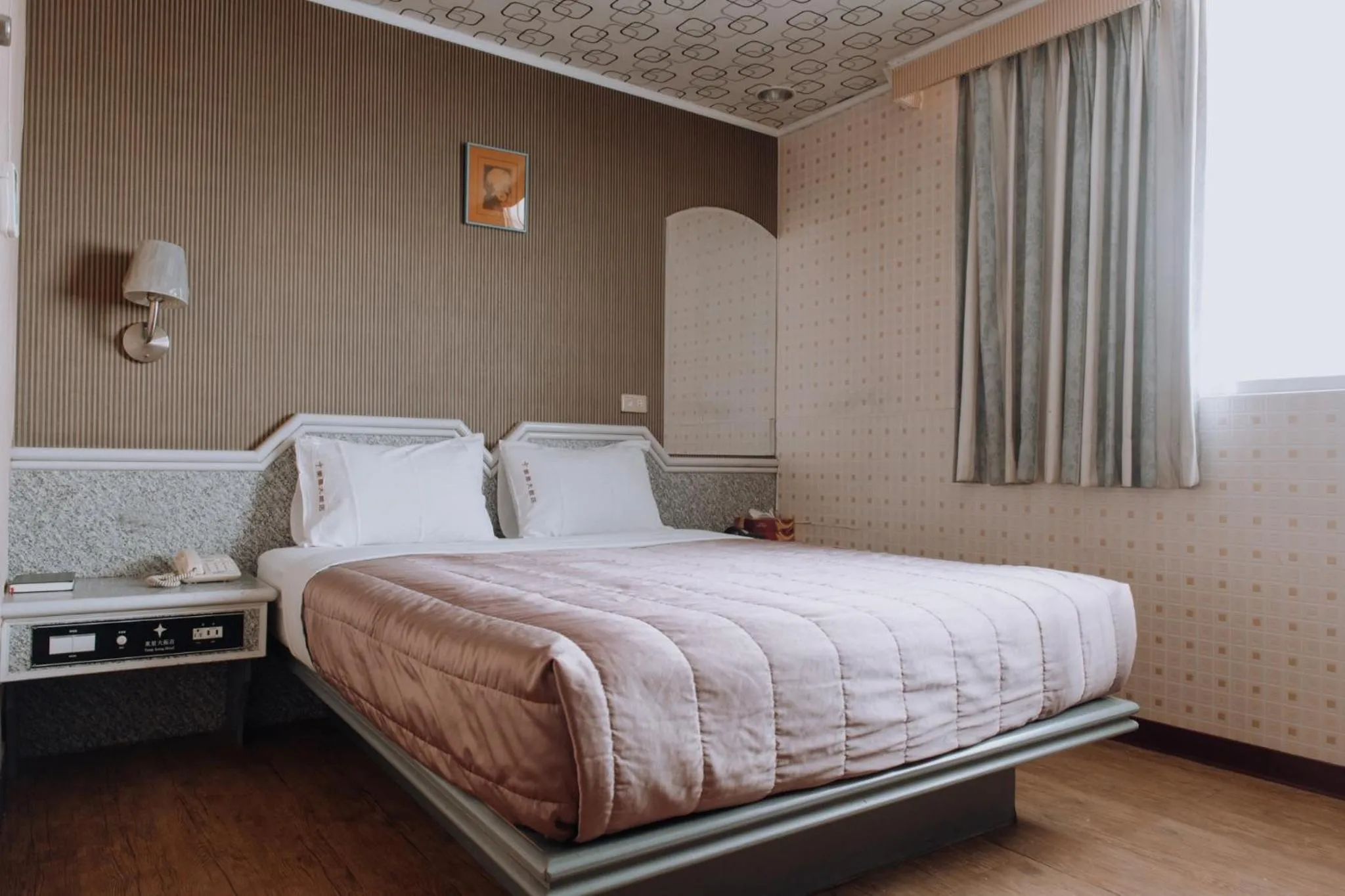 Bed in Tong Hsin Hotel