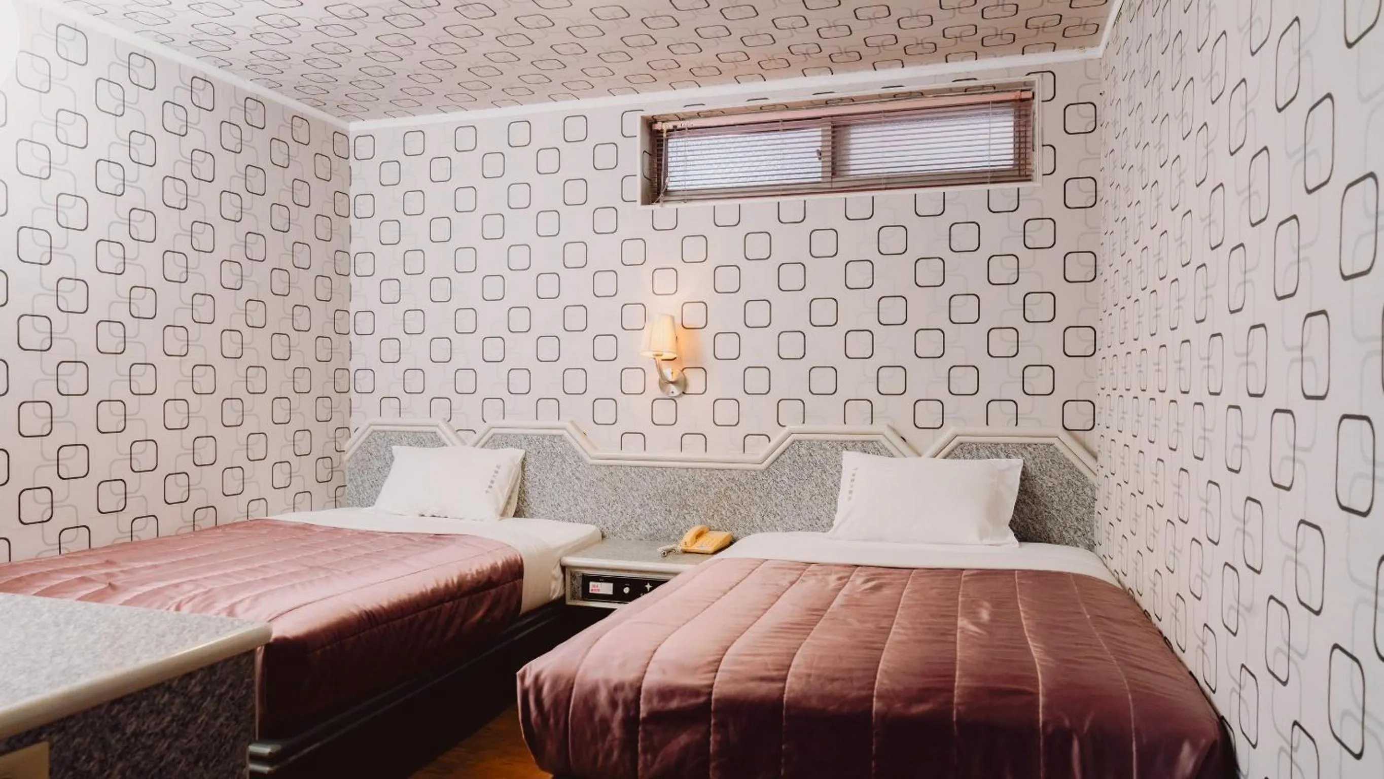 Bed in Tong Hsin Hotel