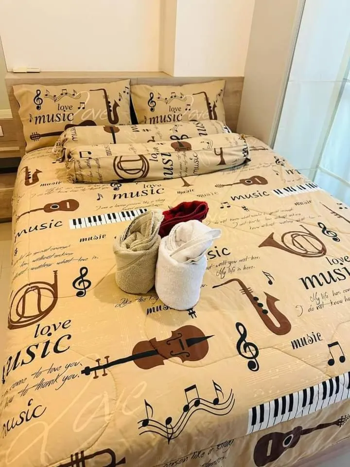 Bed in lumpini park beach