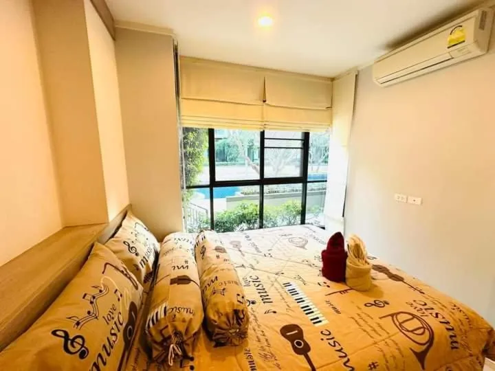 Bed in lumpini park beach