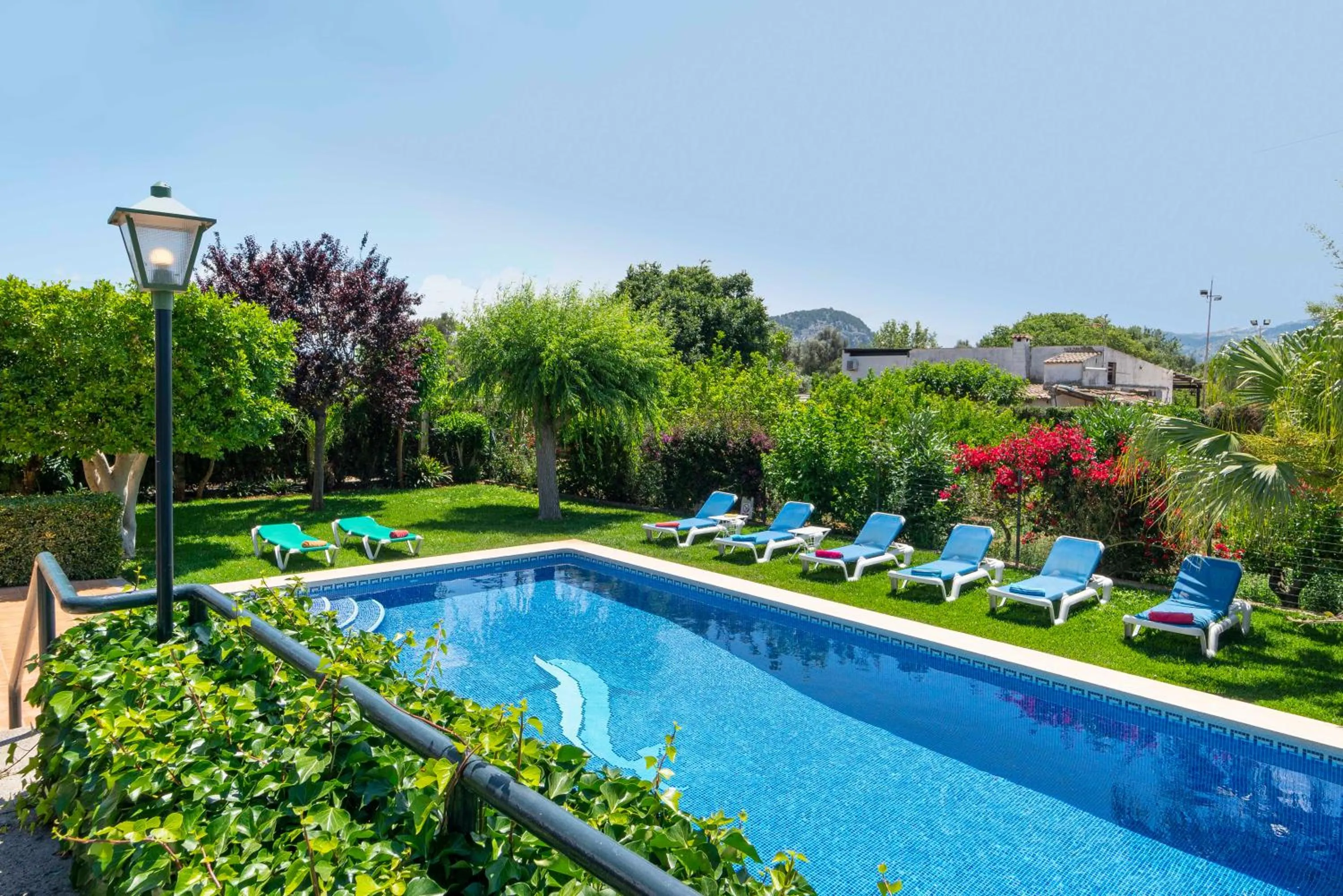 Swimming pool in Family villa can Tomeu By homevillas360