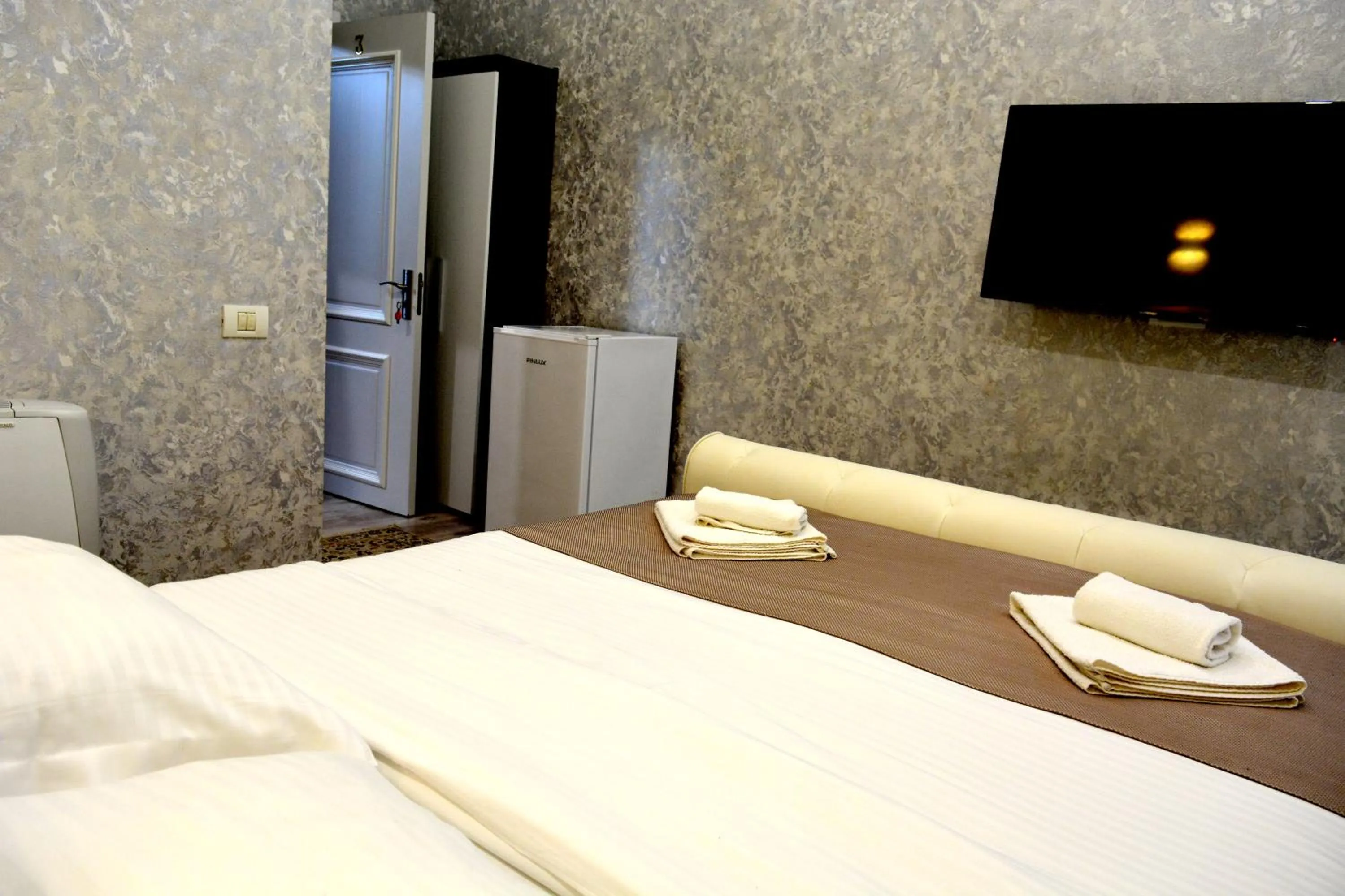 Bed in Arizet Boutique Mamaia